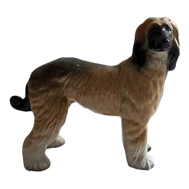 Mid-Century Porcelain Coopercraft Lhasa Apso or Afghan Hound Dog Figurine, England: Beautiful mid-century dog figurine featuring the majestic Lhasa Apso or Afghan Hound breed. Made by Coopercraft of England, of porcelain. Original sticker still affixed. Condition: Alterations: