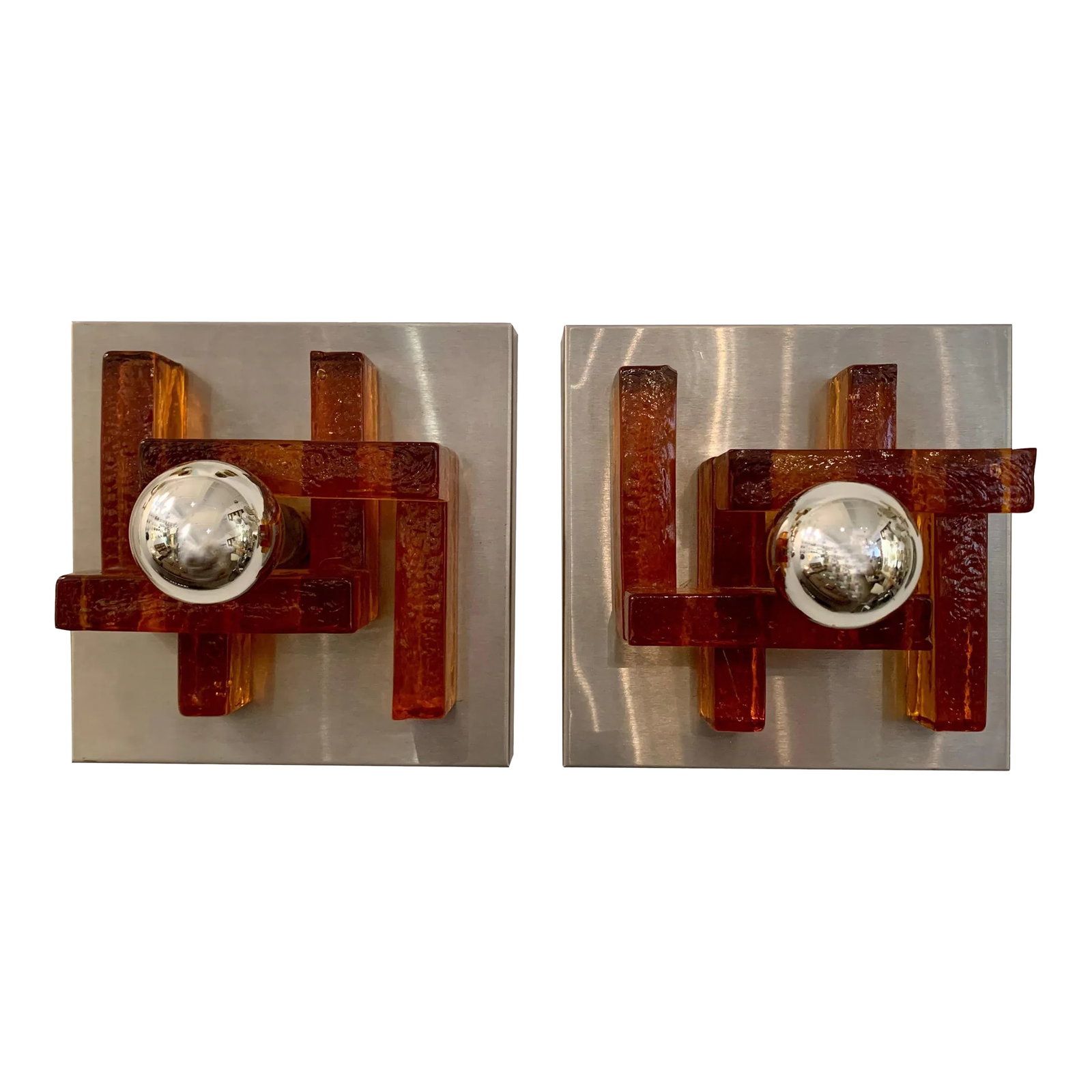 Poliarte Italian Murano Glass 1960s Wall Lights - A Pair: A great pair of sconces composed of thick amber rust color Murano glass and matte steel fixtures. Rewired. Condition: Alterations: Original Design Modified Imperfections: Some Imperfections Condition 