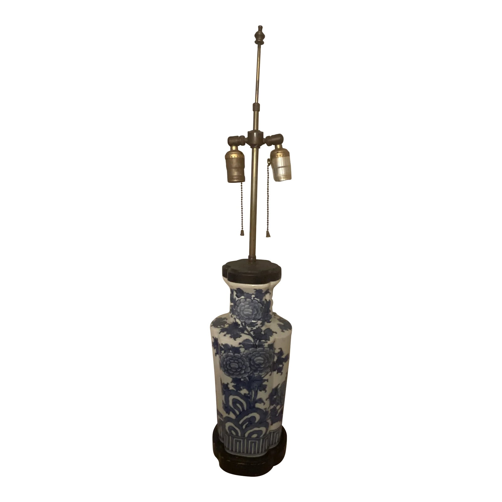 1910s Chinese Blue and White Ceramic Porcelain Lamp With Wooden Base and Cap: A great lamp made of an antique or vintage blue and white Chinese vase or urn. The cap and base are both handmade of lovely dark wood. The piece is very well made and has been rewired prior to