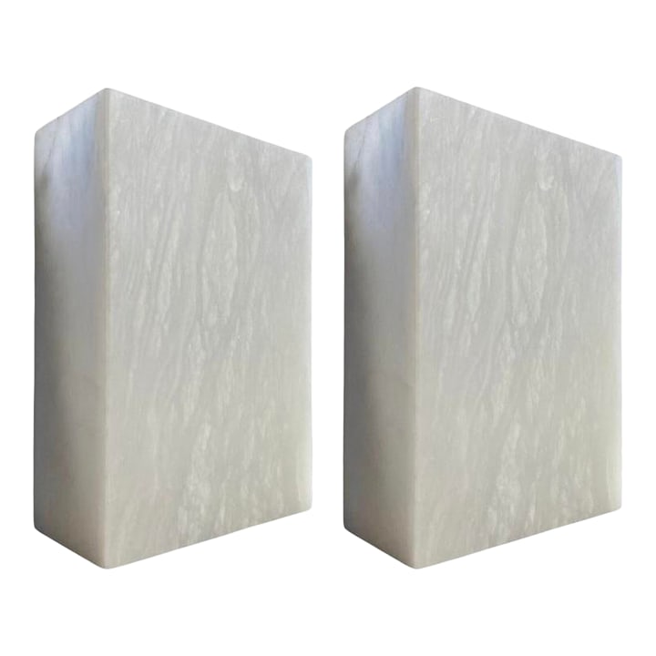 Alabaster Minimalist Sconces, a Pair (Spain), Rectangular Stone: Ultra Minimalist pair of hard-wired sconces in alabaster. Created in Spain, in a clean, uber Modernist design, which reads as deep glowing rectangles once installed. The internal fixture holds three