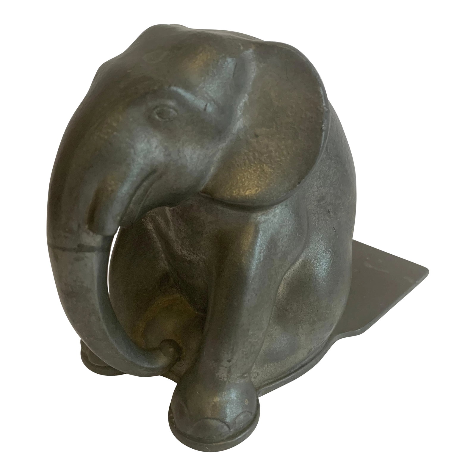 Just Andersen 1930s Danish Pewter Elaphant Book End: One 1930s Danish Art Deco pewter elephant bookend by sculptor, Just Andersen. Condition: Alterations: Unknown Imperfections: Some Imperfections Condition Notes: Good Wear consistent with age and use.