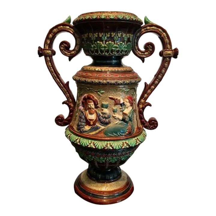 Large 19th Century Majolica 2 Handled Urn by Wilhelm Schiller and Son: This piece will take you back a few centuries. It is quite ornate and the gold accents and background is dazzling. 2 separate but similar pieces have been shown on the internet. Interestingly, One