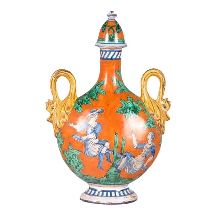 1990s Italian Hand Painted Ceramic Flask in Orange, Green, Blue and Yellow Colors: Hand painted ceramic flask in orange, green, blue and yellow colors featuring male and female figure on front and decorative dolphin handles. Italy. Condition: Alterations: Original Condition