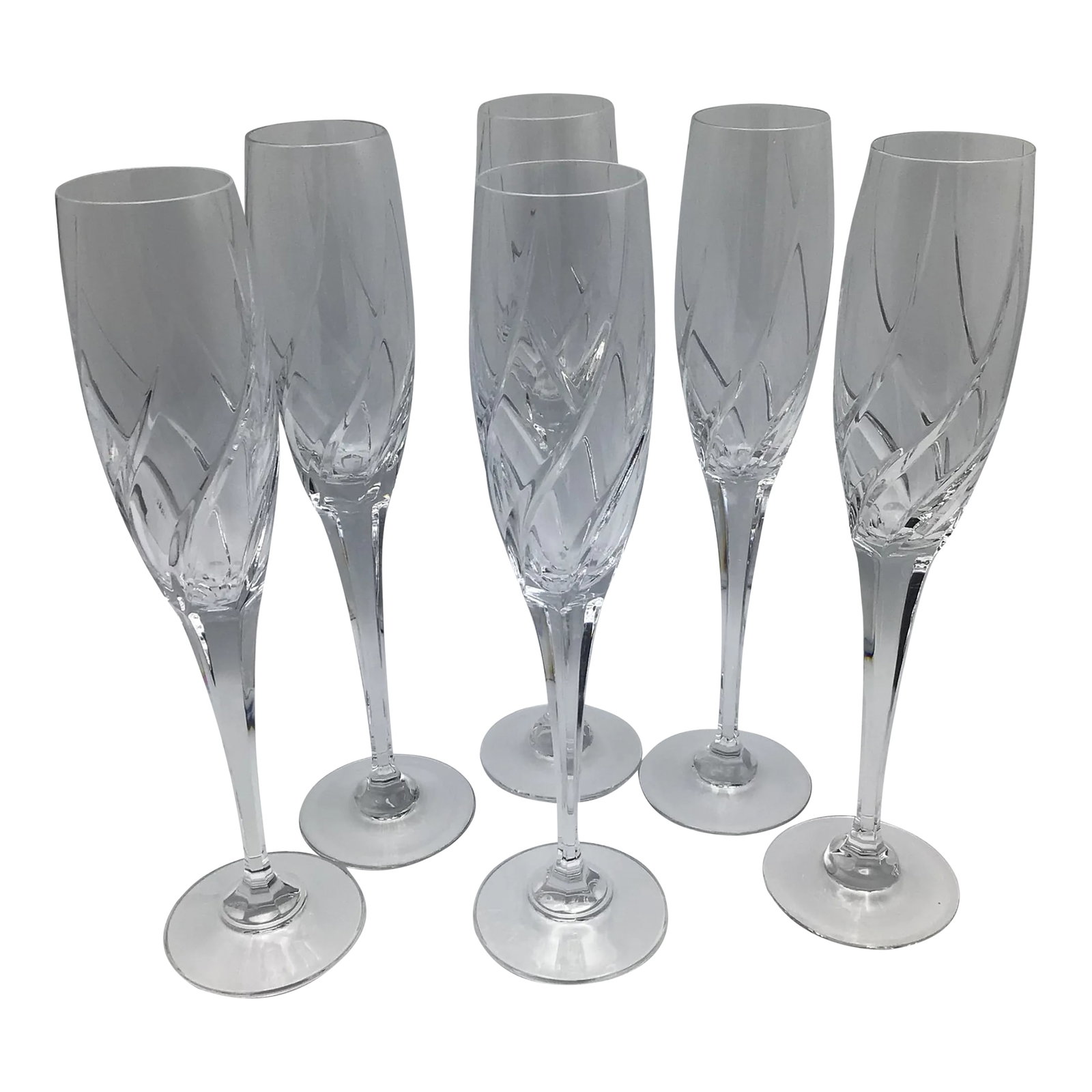 Vintage Mikasa Cut Crystal Olympus Champagne Flutes-Set of 6: If you like quality then you will love the Mikasa's Olympus line of crystal. Here is a set of fine crafted Champagne flutes Glasses. The upward deep cut spiraling pattern depicts a flame rising to