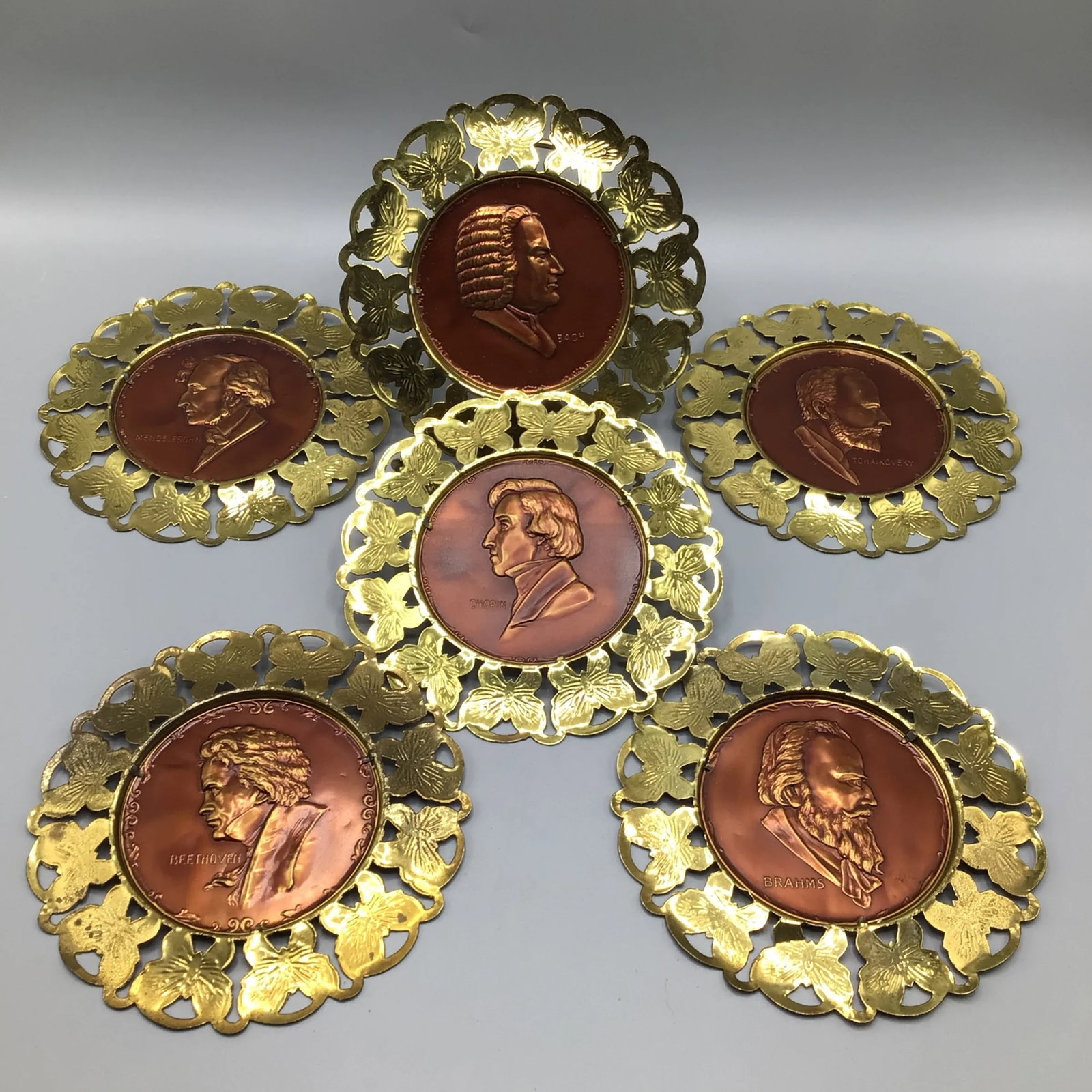 Wall Plates Influential Composers Stamped on Yellow Brass and Butterfly Filigree Made in England-Set - 13
