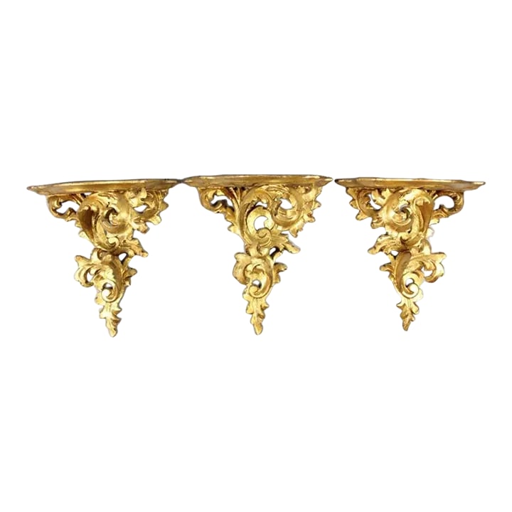 1950s Carved and Quilted Rococo Hollywood Regency Italian Wooden Wall Brackets- Set of 3: Aged with a lovely patina. These rococo style Hollywood regency brackets would compliment any room. Perfect for that small bust, Meissen bird or chinoiserie objet. Each bracket or wall shelf is very w