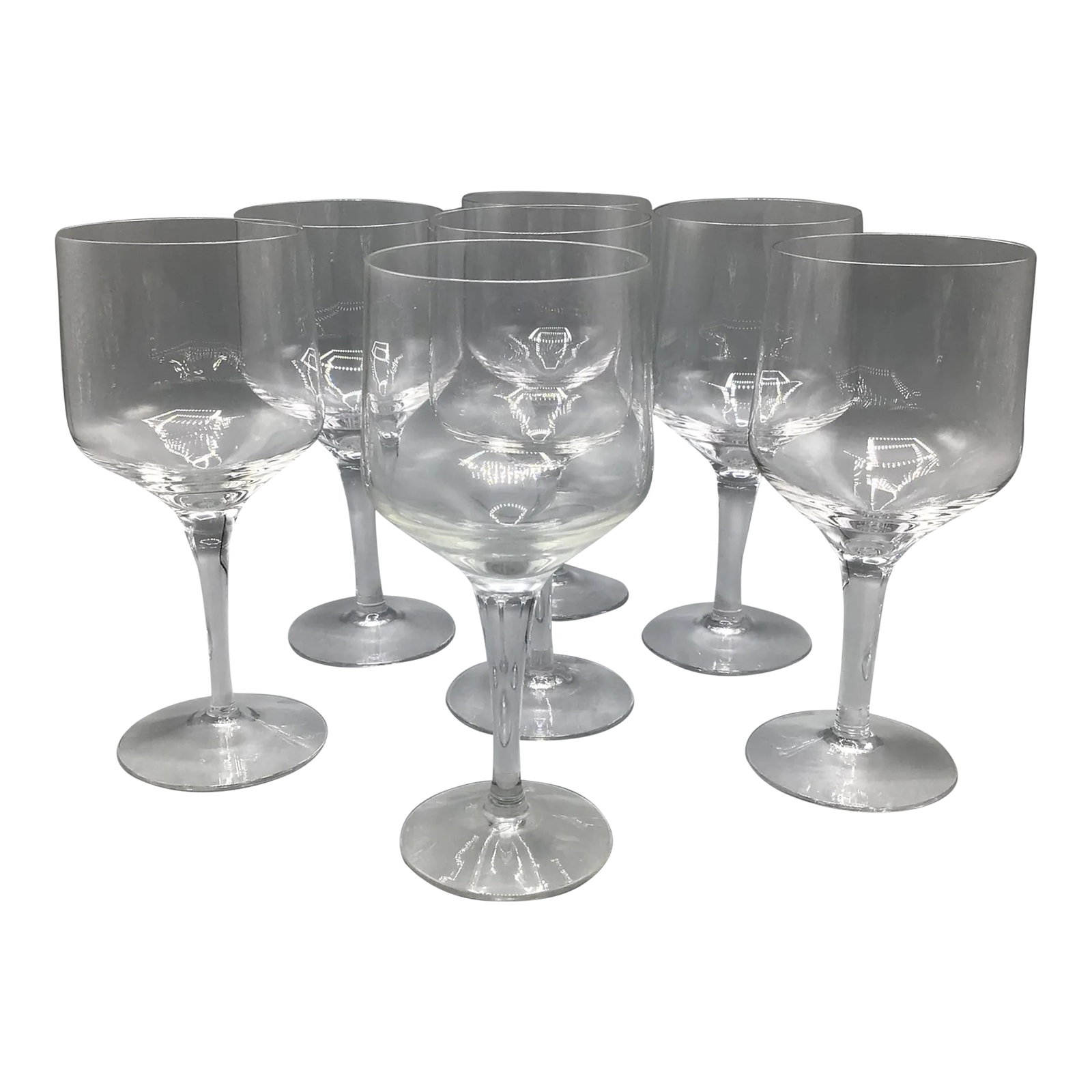 Swedish Orrefors Rhapsody Claret Wine Glasses-Set of 6: Set of 7 Midcentury Modern Orrefor Rhapsody crystal claret wine glasses were made in Sweden. These Mid-century blown crystal glasses with clean lines are a very light and were designed by Sven