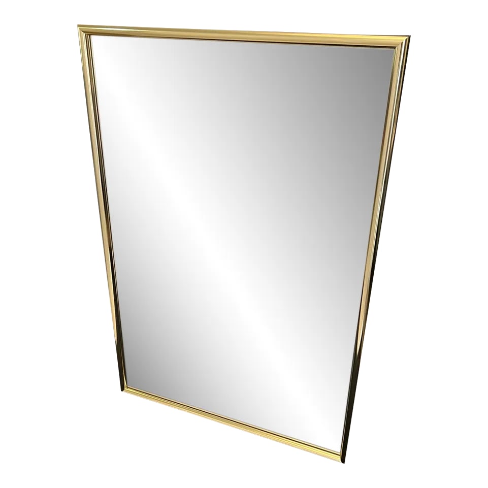 Large Mid-Century Modern Brass Framed Mirror: Sleek and stylish large Mid-Century Modern brass-plated mirror A "statement" addition to your Foyer, Living Room, or Dining Room...where it can reflect natural light and give the space a larger, more
