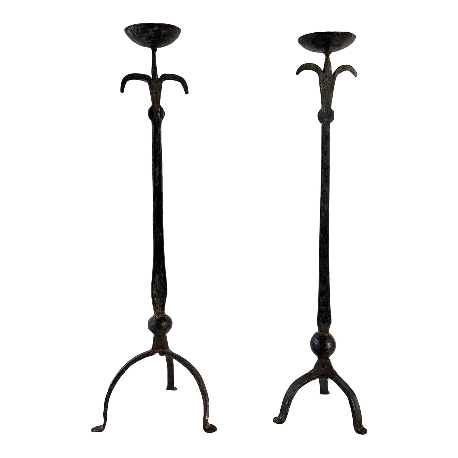 Brutalist Hand Forged Iron Candle Holders: Vintage late 70s early 80s hand forged brutalist candle holders. These are handcrafted and although a pair they are slightly different. The spike holders secure your taper or pillar candle on the top.
