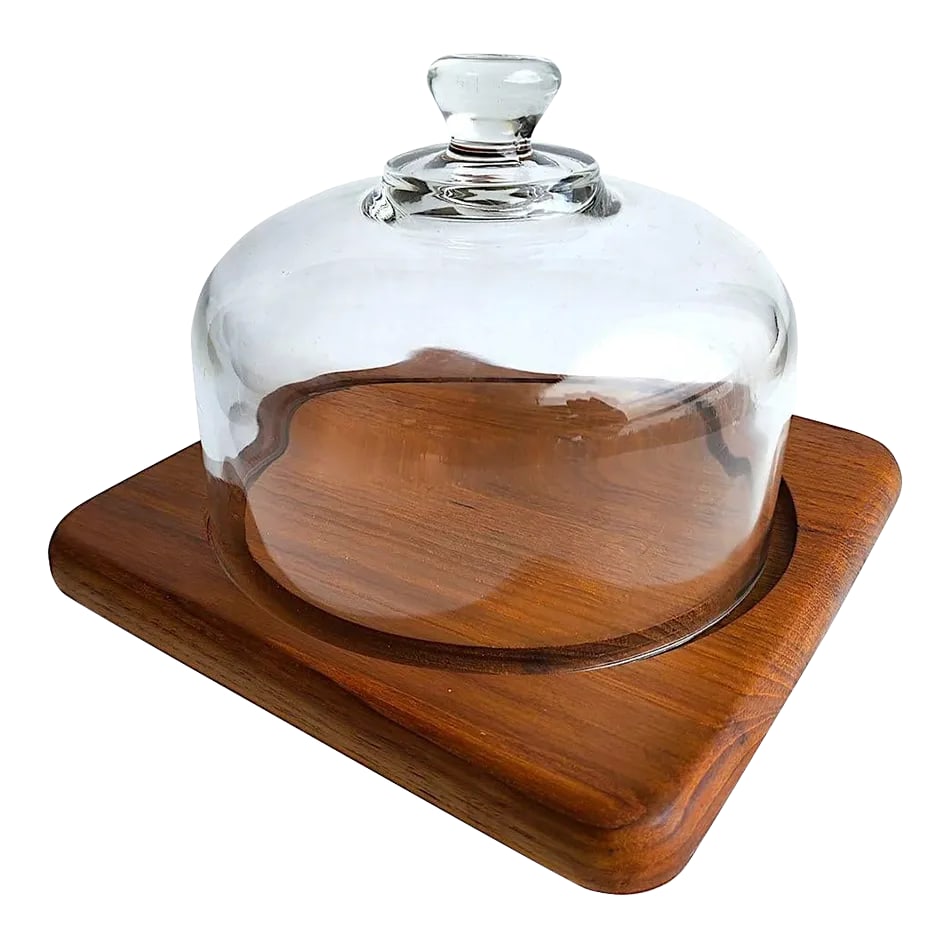 1970s Square Teak Wood Charcuterie Board With Glass Cloche: Offered is a charming small square teak cheese/charcuterie board with a glass cloche made by Goodwood in the 1970s. Perfect for a small cocktail, a couple's snack, or to hold your morning butter and