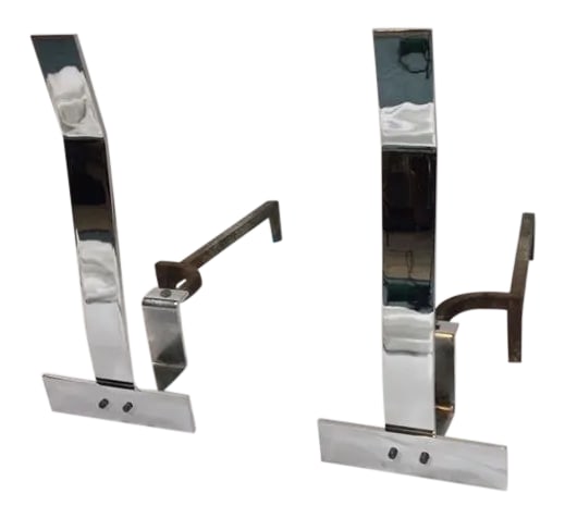 1970s Alessandro Albrizzi Modernist Chrome Andirons - a Pair: This sophisticated pair of modernist andirons were realized by designer Alessandro Albrizzi in Italy, circa 1970. They feature chrome inverted T-forms consisting of a horizontal band bisected at its