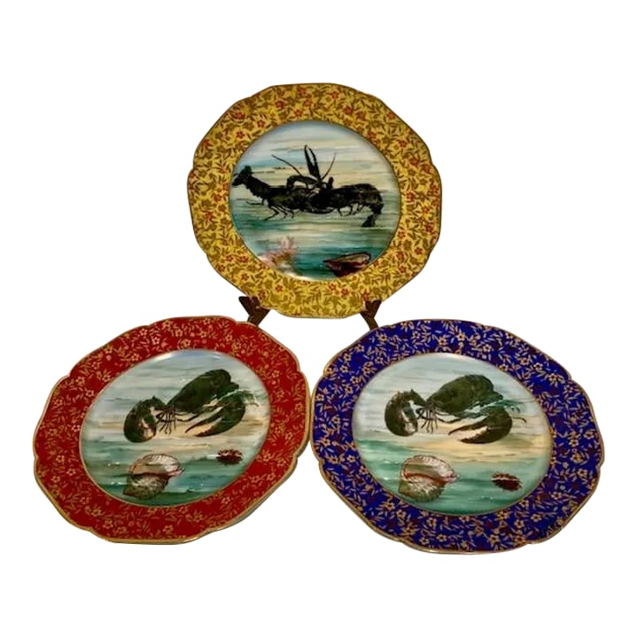 Antique Limoges Porcelain Plates With Lobsters and Shells- Set of 3: These beautiful Gold Gilded Plates make these Lobsters look charming. I love the seashells and the slightly textured water. And, contrast the scene with the floral gold gilded border and the Lobsters 