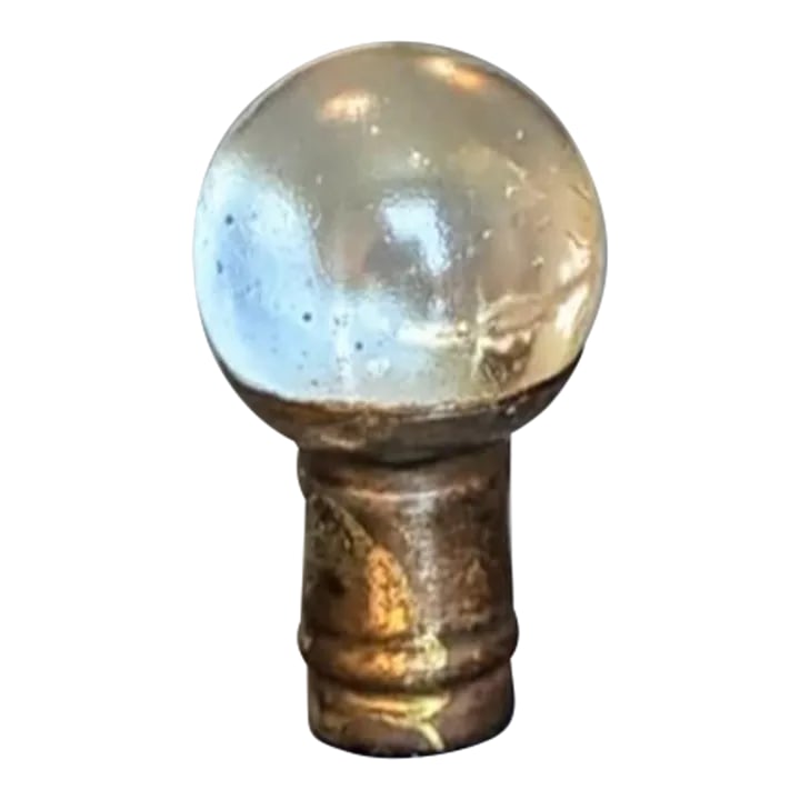 Old Crystal Ball Finial With Brass Trim: CORRECTION TO SHIPPING TIME, THIS IS SELLER SHIPPING, ARRIVAL TIME IS 4-10 DAYS FROM PURCHASE DATE. A vintage finial, brass tone trim with a round glass ball. Not sure the material of the base, nice s