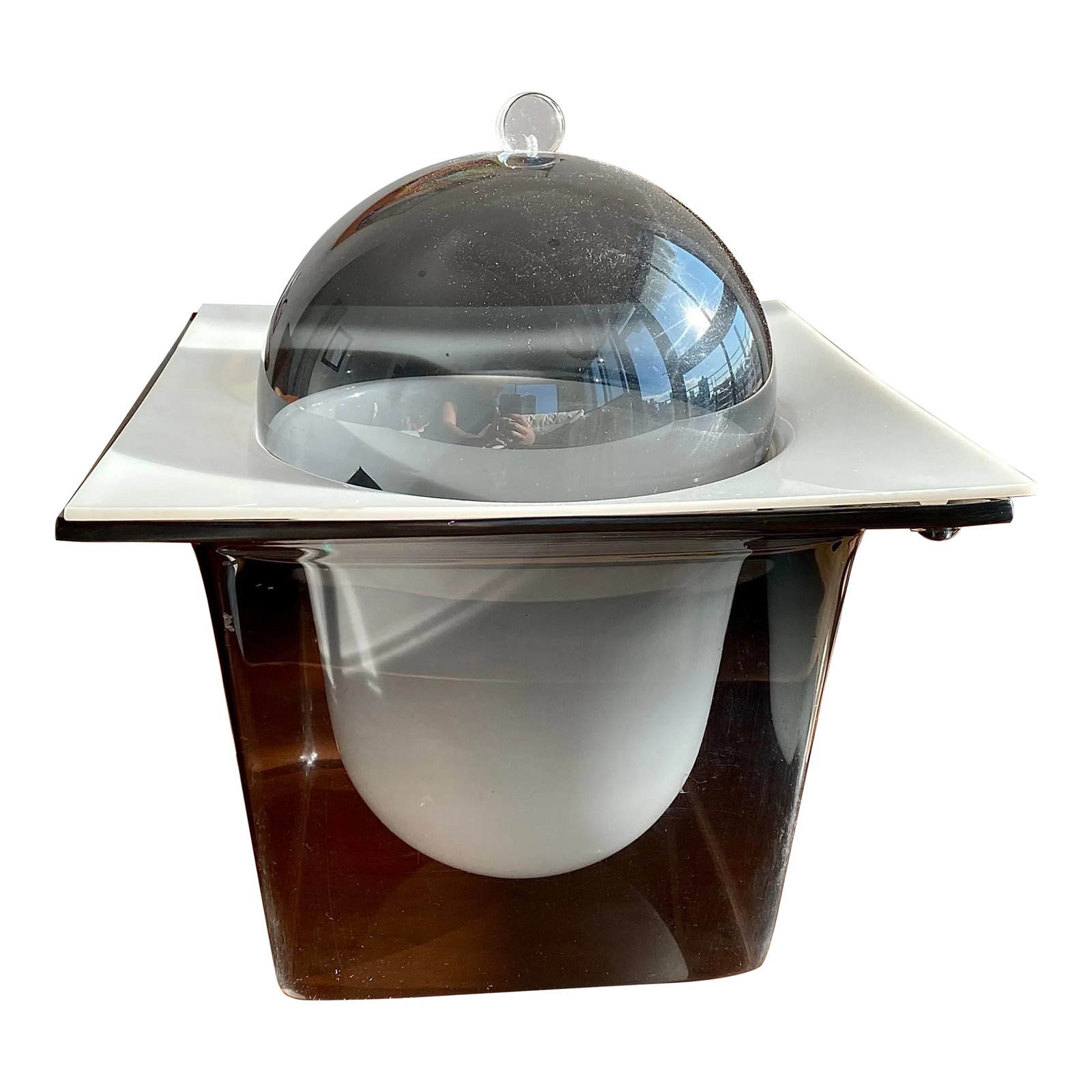 1970s Space Age Lucite Ice Bucket: Elevate your barware collection with this vintage Space Age ice bucket from the 1970s. Featuring a sleek, semi-translucent black lucite container and dome lid, it comes with a fitted white acrylic