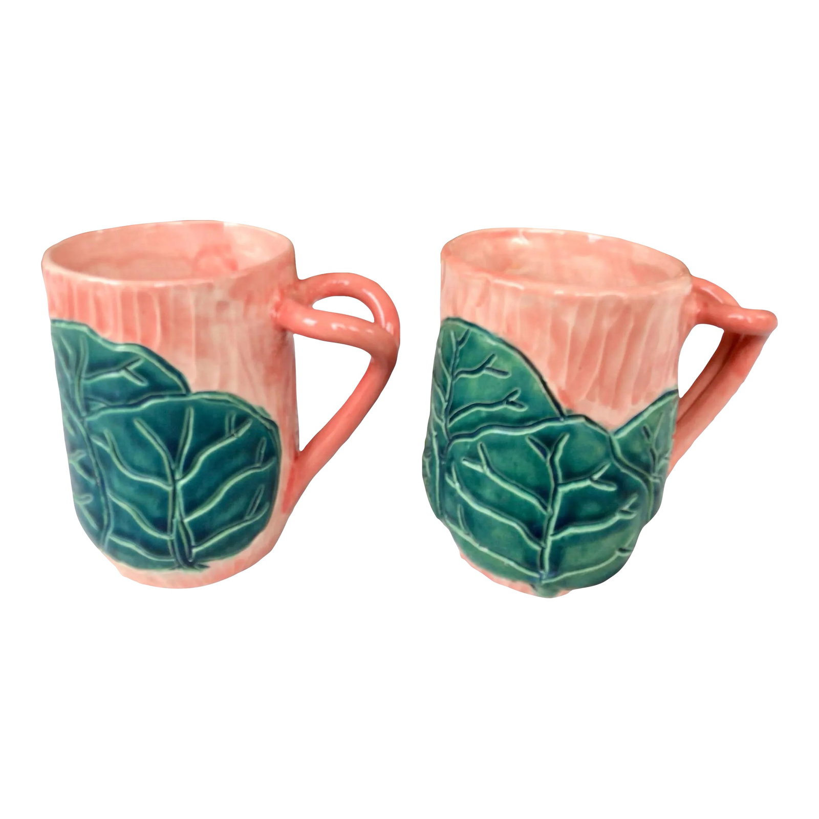 Jessica Colebrooke Lyford Ceramic Mugs With a Lilly Pad Motif- Set of 2: Jessica Colebrooke ceramic mugs with a lilly pad motif. Artist is based in the Bahamas and known for her colorful art portraying nature. Two mugs, each with "Lyford" scrolled on outside. Top of mug me