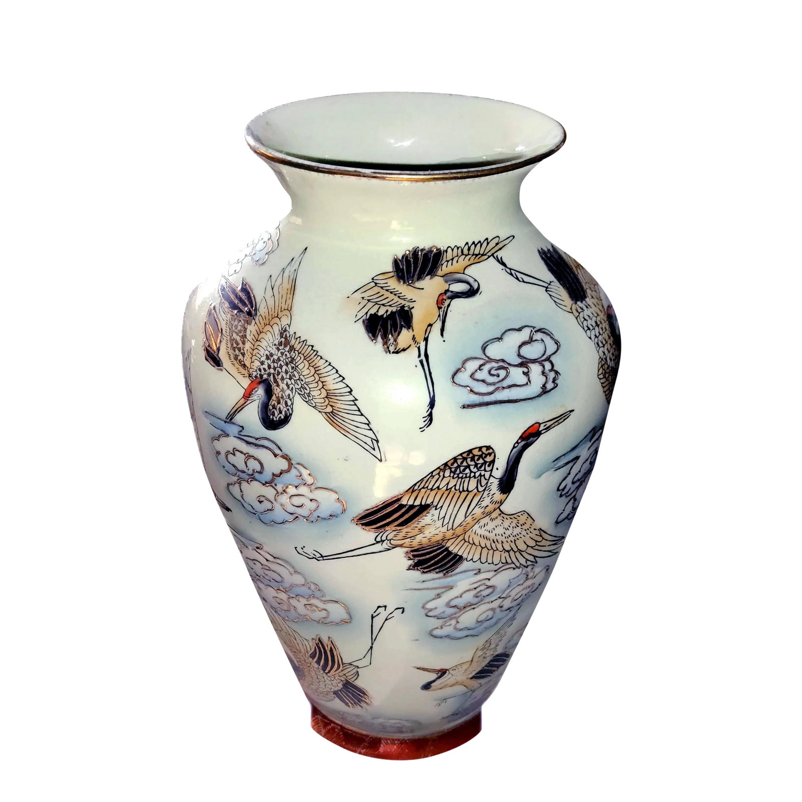 Chinese Famille Rose Polychrome Freehand Raised Cranes & Clouds Motif Porcelain Vase: A famille rose free-hand painted flying cranes & raised gold lined clouds motif porcelain vase. The flying crane when shown among clouds, stands for longevity, wisdom and nobility. This motif is seen 
