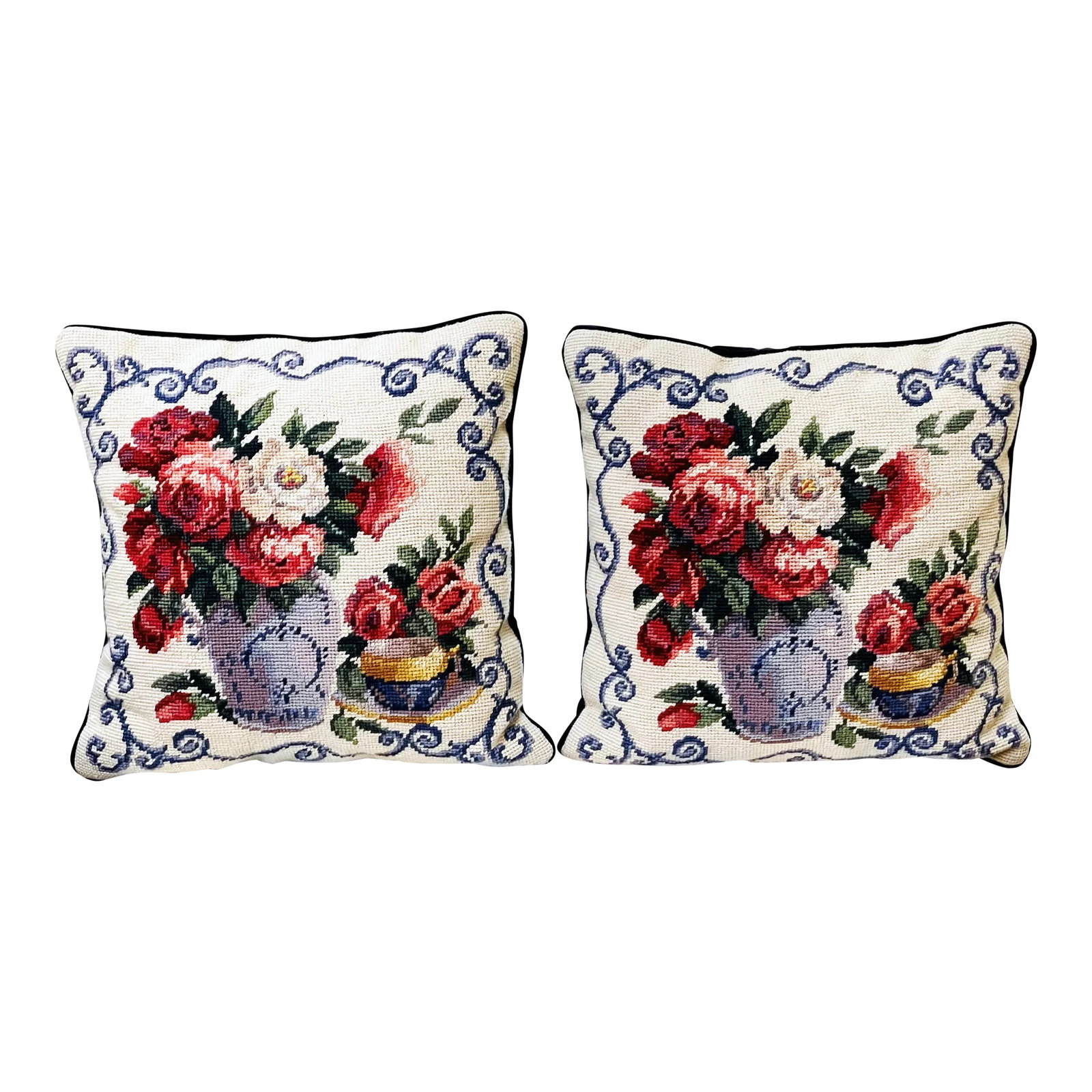 Vintage Mid-Century Pair of Hand-Embroidered Floral Accent Pillows in Aubusson Style: These two hand-embroidered accent pillows were stitched in the Aubusson-style of embroidery. The entire surface of the fabric is covered with the identical type of stitch. Colors are chosen as from a