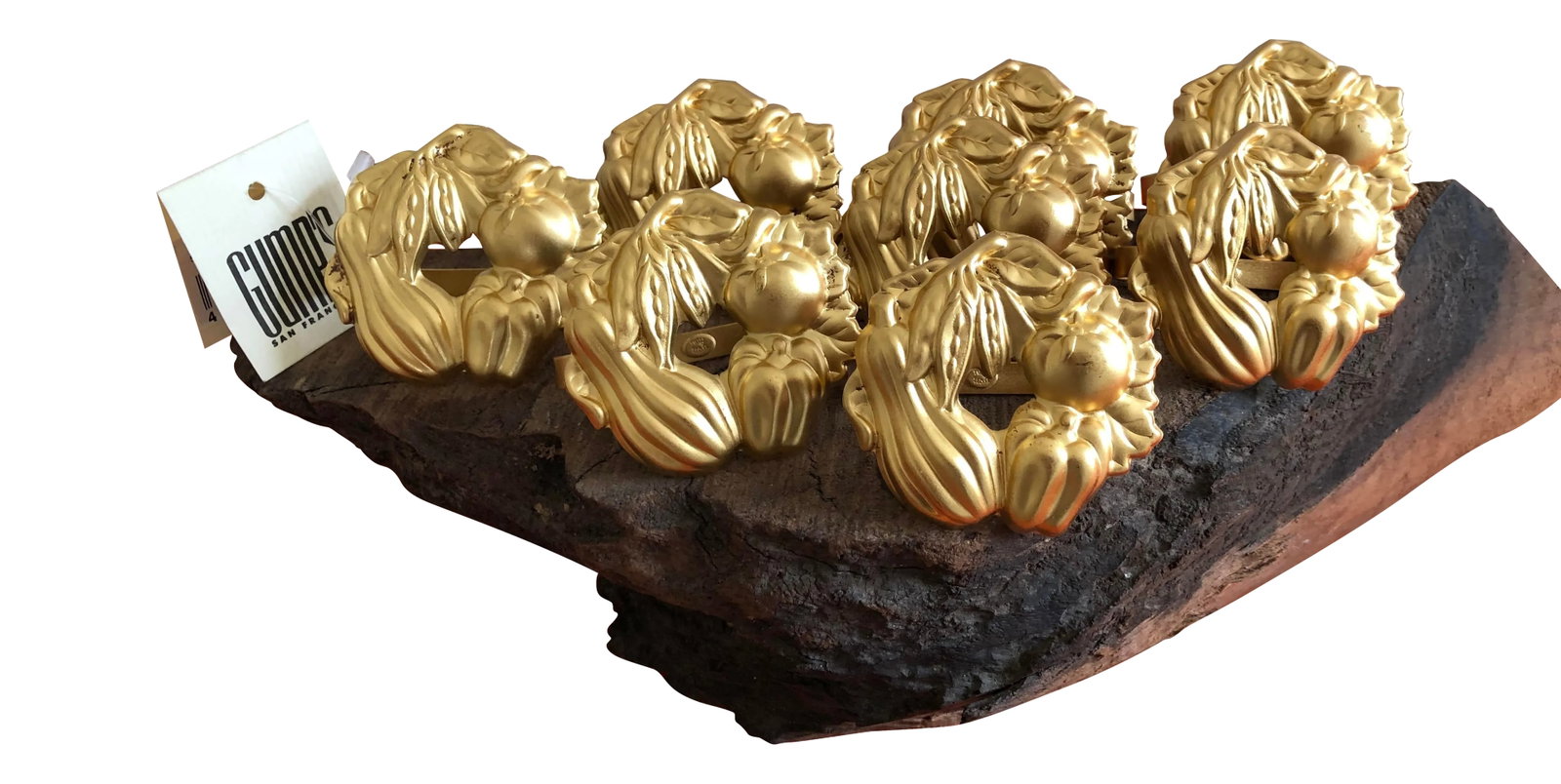 Vintage Gump's Stamped Metal Matte Gold Vegetables Napkin Holders 16: Wonderful set of matte gold stamped metal napkin rings from GUMPS San Francisco. Round wreath of vegetables in very classic and elegant gold. Definite MUST for entertaining this Fall. There are 16 tot