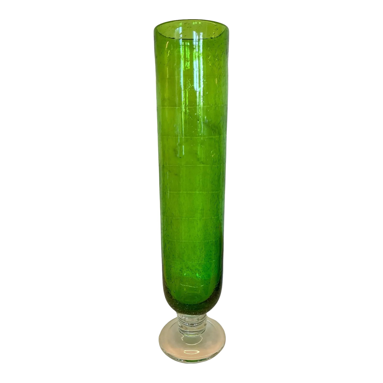 1970s Tall Cylindrical Green Glass Vase: Tall Cylindrical Green Glass Vase. Hand-made with bubble detail in glass. Clear pedestal with green cylinder vase vessel. Gorgeous with cut flowers placed inside or just as pretty on its own.