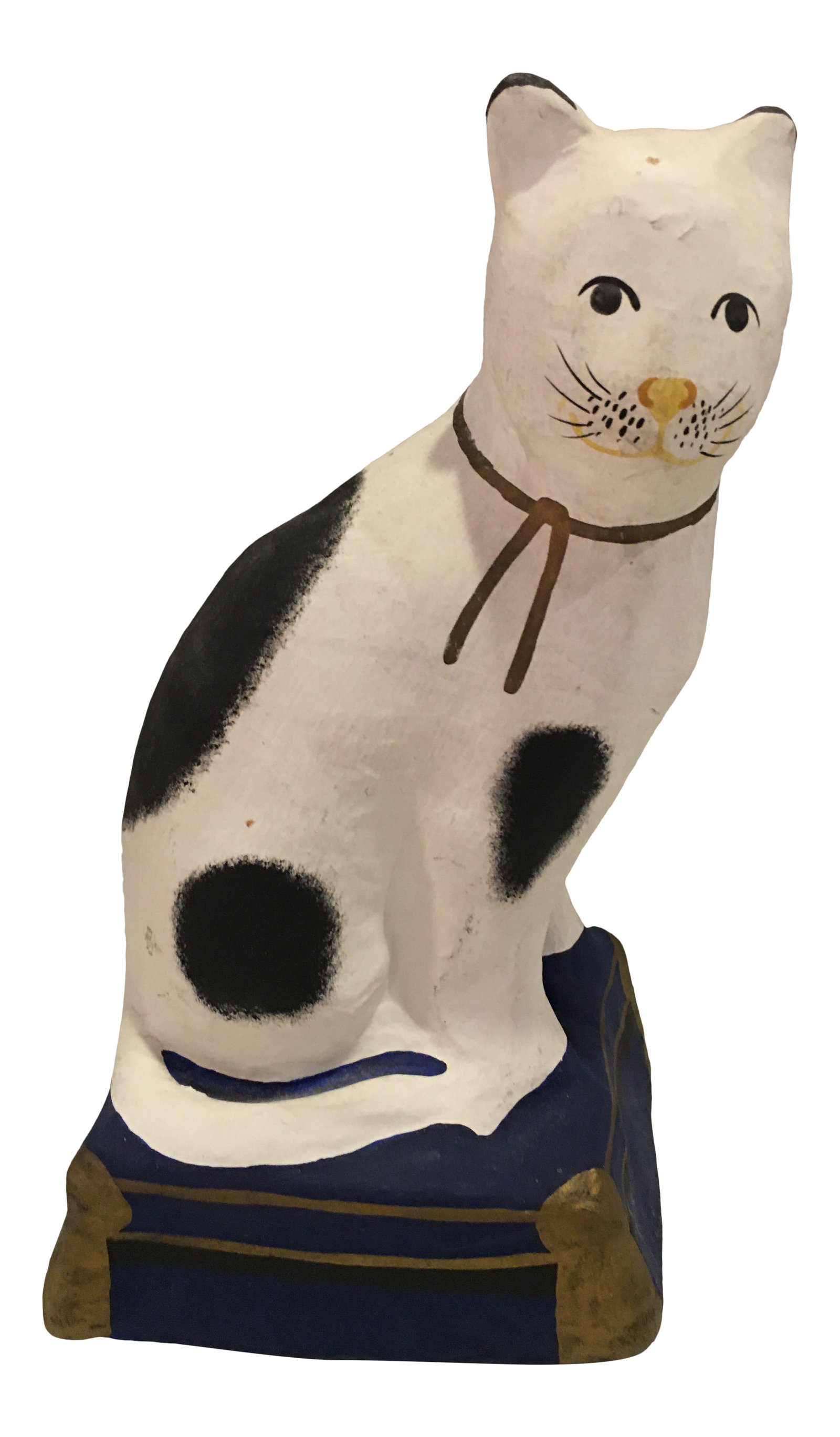 Fitz & Floyd Paper Mache Cat on Tasseled Pillow: Regal black and white cat seated on royal blue tasseled pillow. Measures 10" x 5.5"x 4.5". Foil label on bottom. Made in Thailand. Condition: Alterations: Original Condition Unaltered Imperfections: