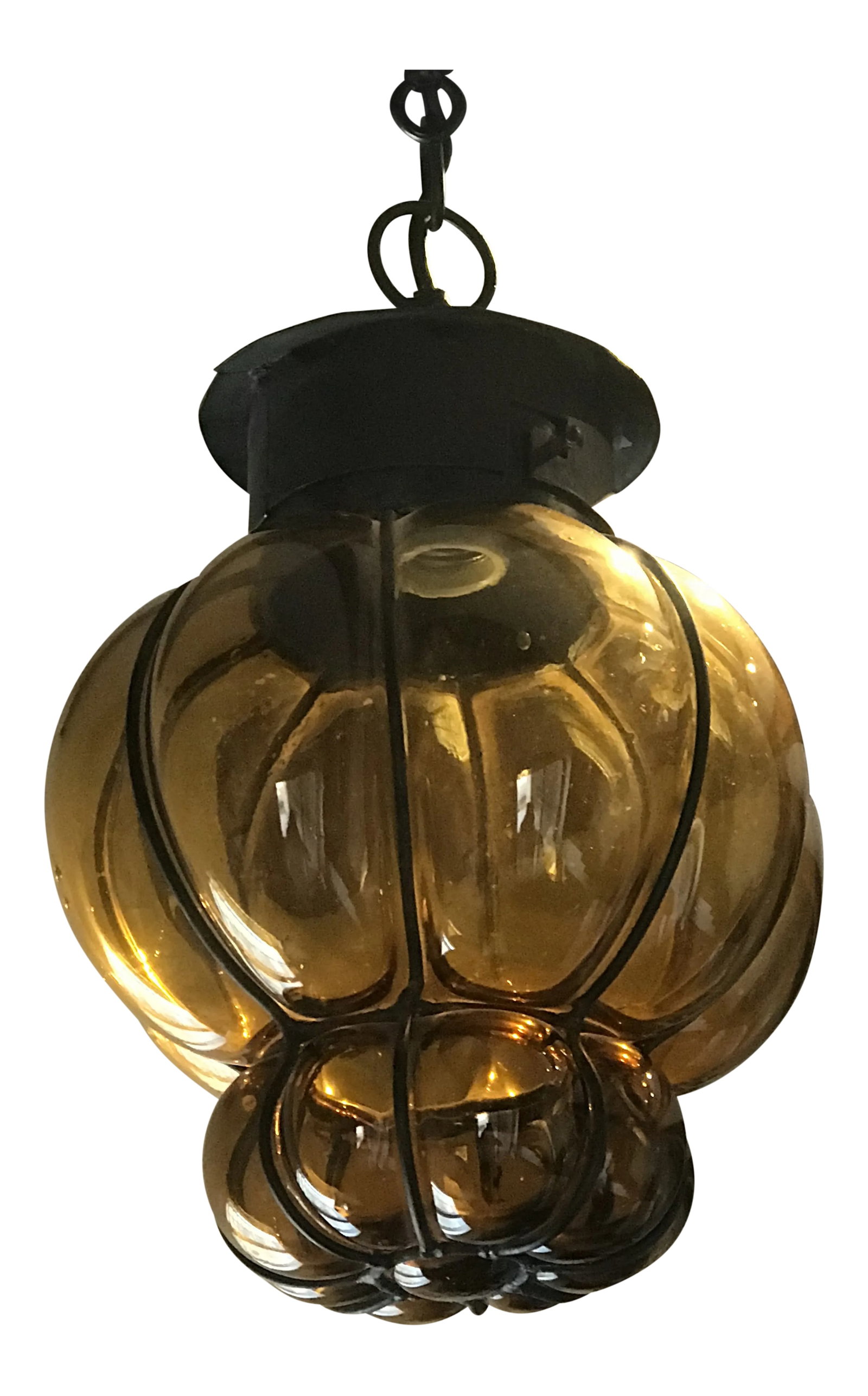1960's Mexican Blown Glass and Wrought Iron Pendant: A classic Mexican style, amber blown glass and wrought iron pendant light rescued from a ranch in Mexico Condition: Alterations: Original Condition Unaltered Imperfections: Some Imperfections