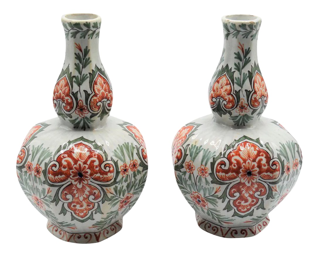 Antique Dutch Delft Polychrome Vases - a Pair: A fine quality pair of 19th-Century Dutch Delft vases. They are hand molded and hand painted in polychrome with geometric and floral designs. The maker's mark is on the reverse. They are lovely and