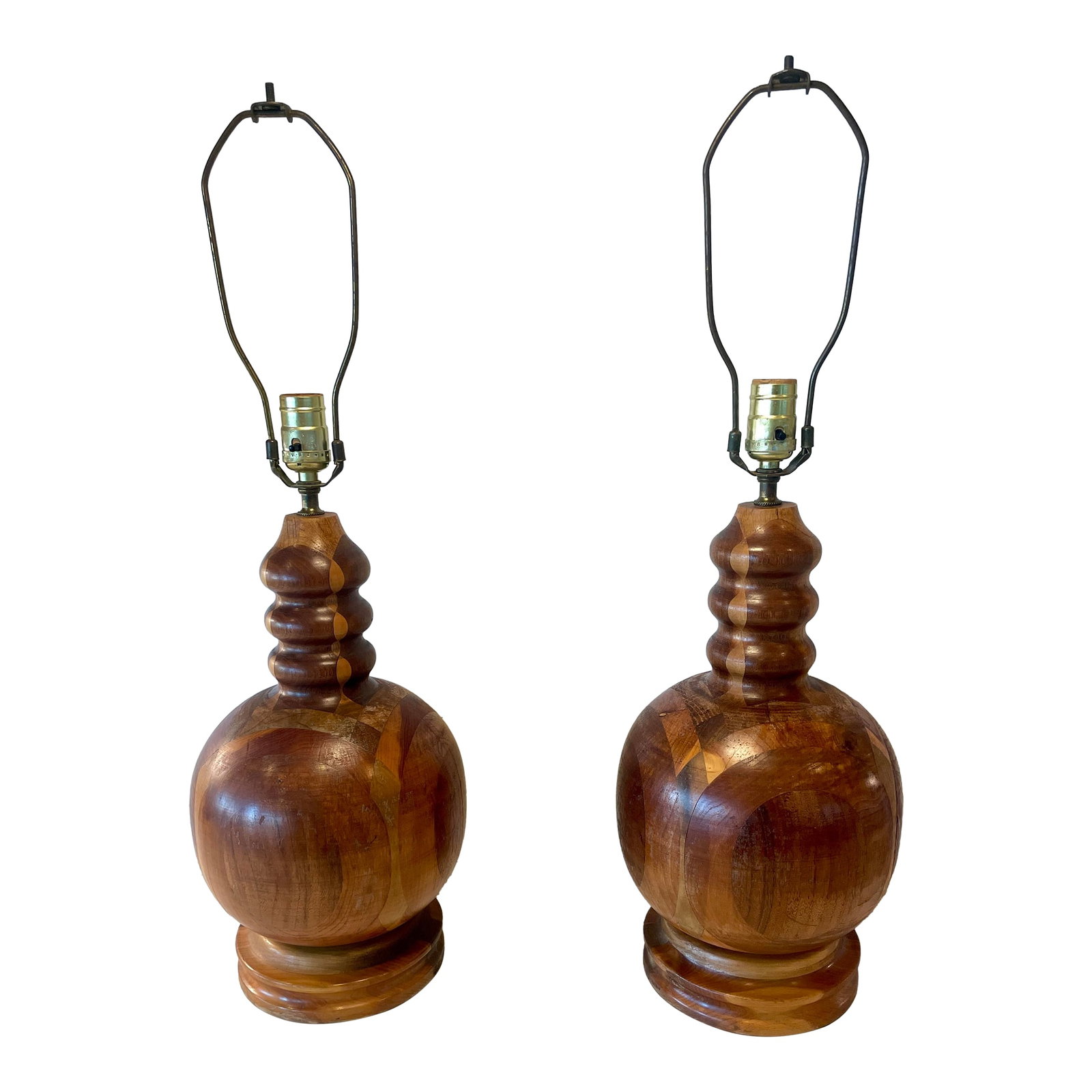 Vintage Marquetry Turned Wood Artisan Crafted Lamps- A Pair: A beautiful pair of patterned, inlaid wood lamps, hand signed by the artisan. Measure 19" to the top of the socket, harps are approximately 10", base diameter is 7" with an approximate width and