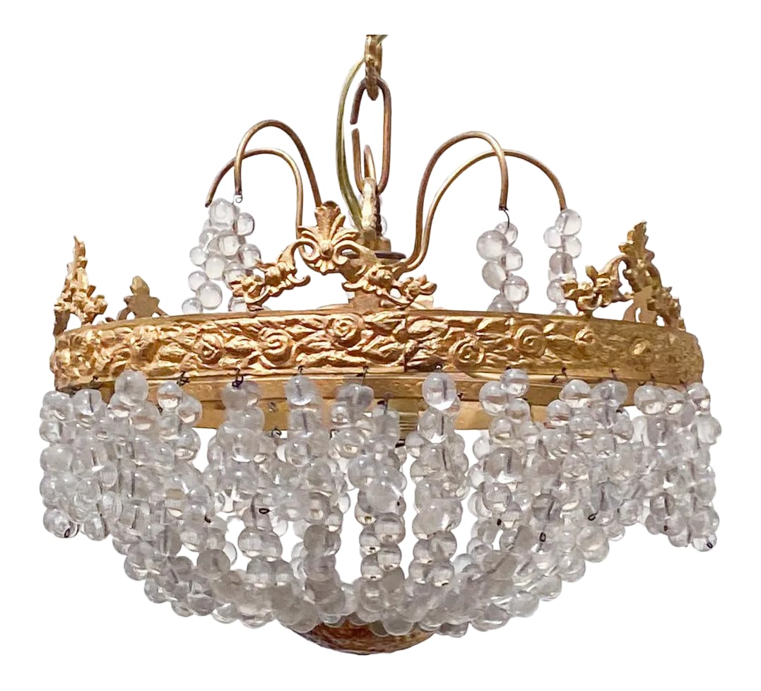 Vintage Brass Basket Chandelier: Vintage basket chandelier with brass rim frame and vintage bead chains. It has 1 edison base socket that can hold up to 100W light bulb that was rewired. #20 Condition: Alterations: Restored Imperfect