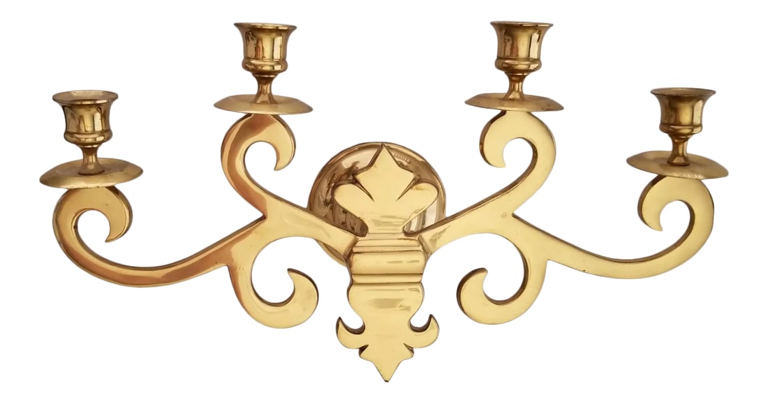 Vintage Solid Brass Wall Sconce 4 Candle Holders Fleur De Lis: We love this extraordinary brass candle sconce for the shiny brass finish and interesting fleur-de-lis center design. This brass is solid and heavy and will accomodate four candles. This sconce can be