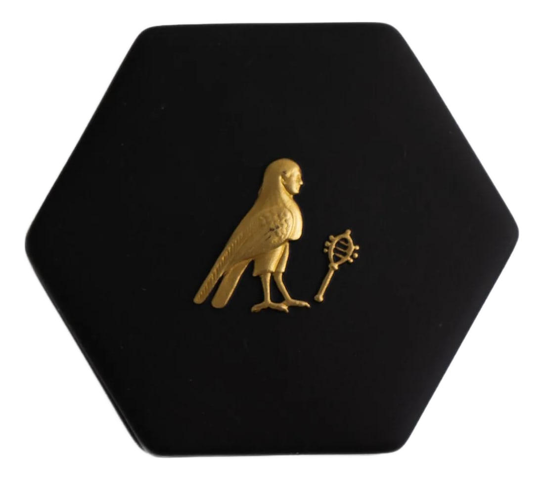 Vintage Wedgwood Black Jasperware Hexagonal Trinket Box With Egyptian Horus Relief: Vintage Wedgwood trinket box in rare black jasperware with striking gold accents. This hexagonal treasure features a detailed relief of the Egyptian god Horus. An exquisite vessel for jewelry storage 