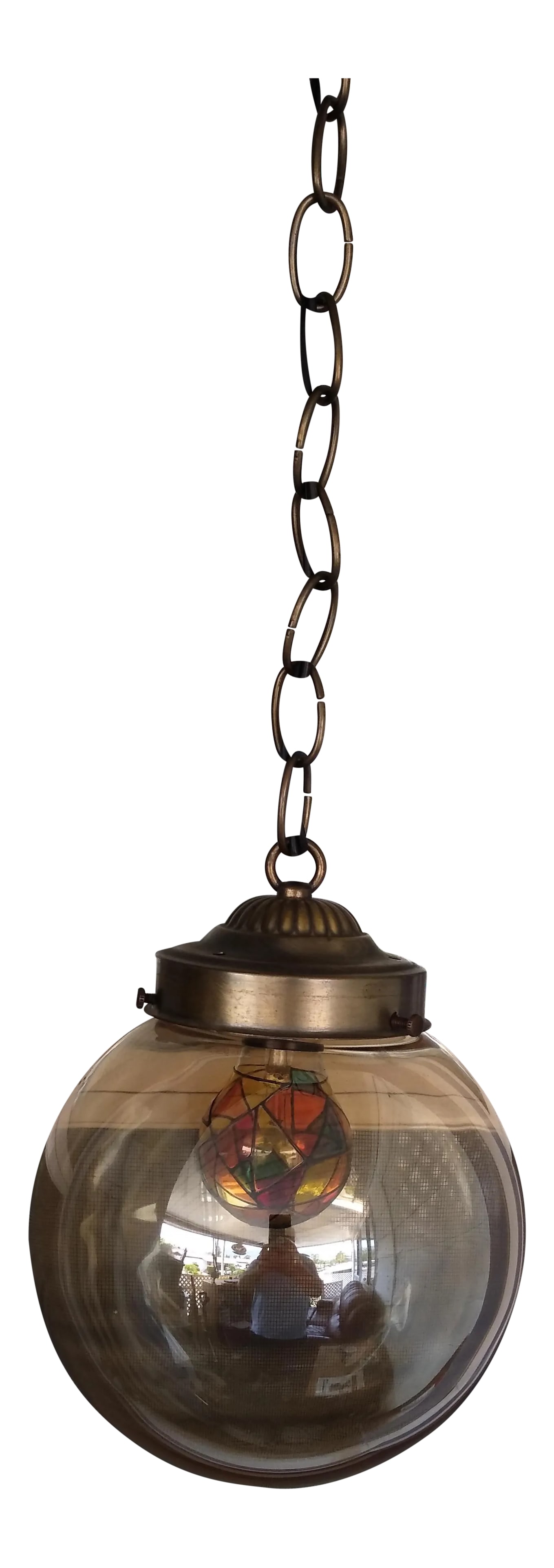 1970s Amber Glass Globe Lamp: Indoor/ outdoor 1970's pendant globe lamp, glad has amber hue glass globe, length is 24" from globe to mounting plate and has a 10' plug in cord. Great for any room in the house or yard. Mid-Century m