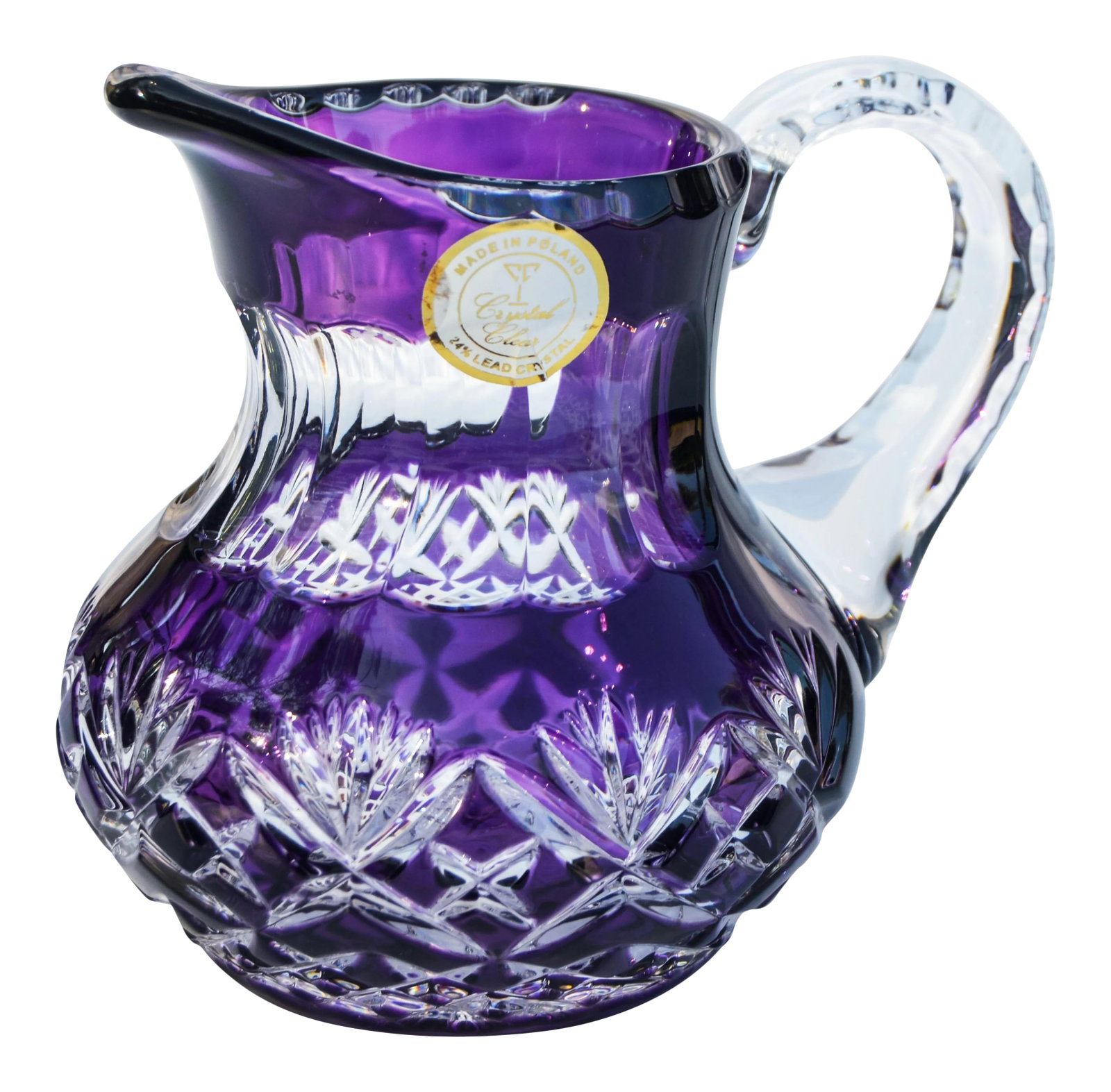 Amethyst Purple Crystal-Cut Pitcher: Midcentury clear and amethyst purple crystal pitcher, elegantly hand-cut with ornate details. Marked: Made in Poland. This beautiful accent ships within 1-2 business days from purchase, and to be rece