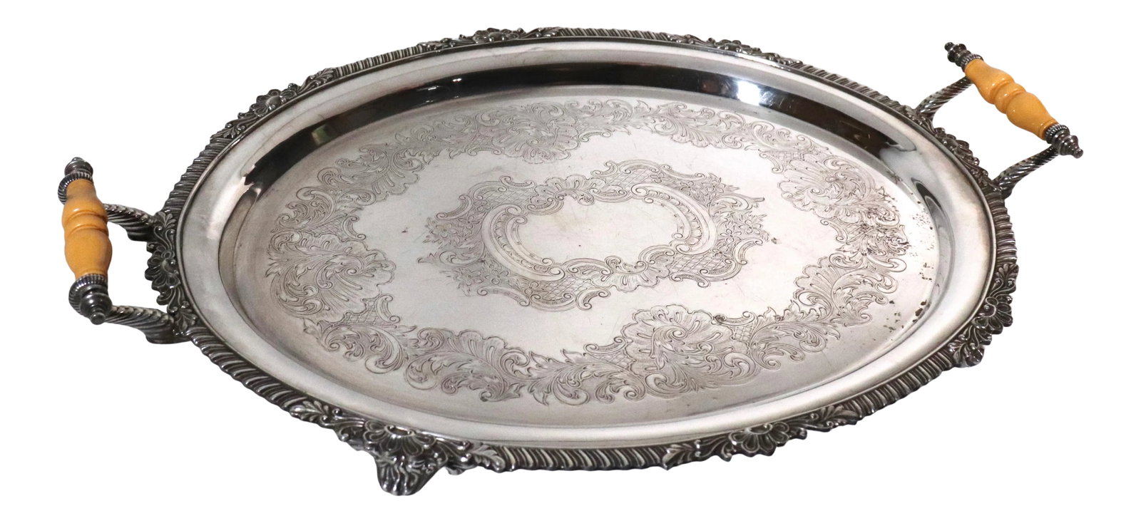 Vintage Silver on Copper Footed Serving Tray With Celluloid Handles: Circa 1950 American silver on copper footed serving tray with celluloid handles by the Crown Silver Company Inc. of Brookline, MA active c. 1935/1950. The antecedents of the Crown Silver Company were 