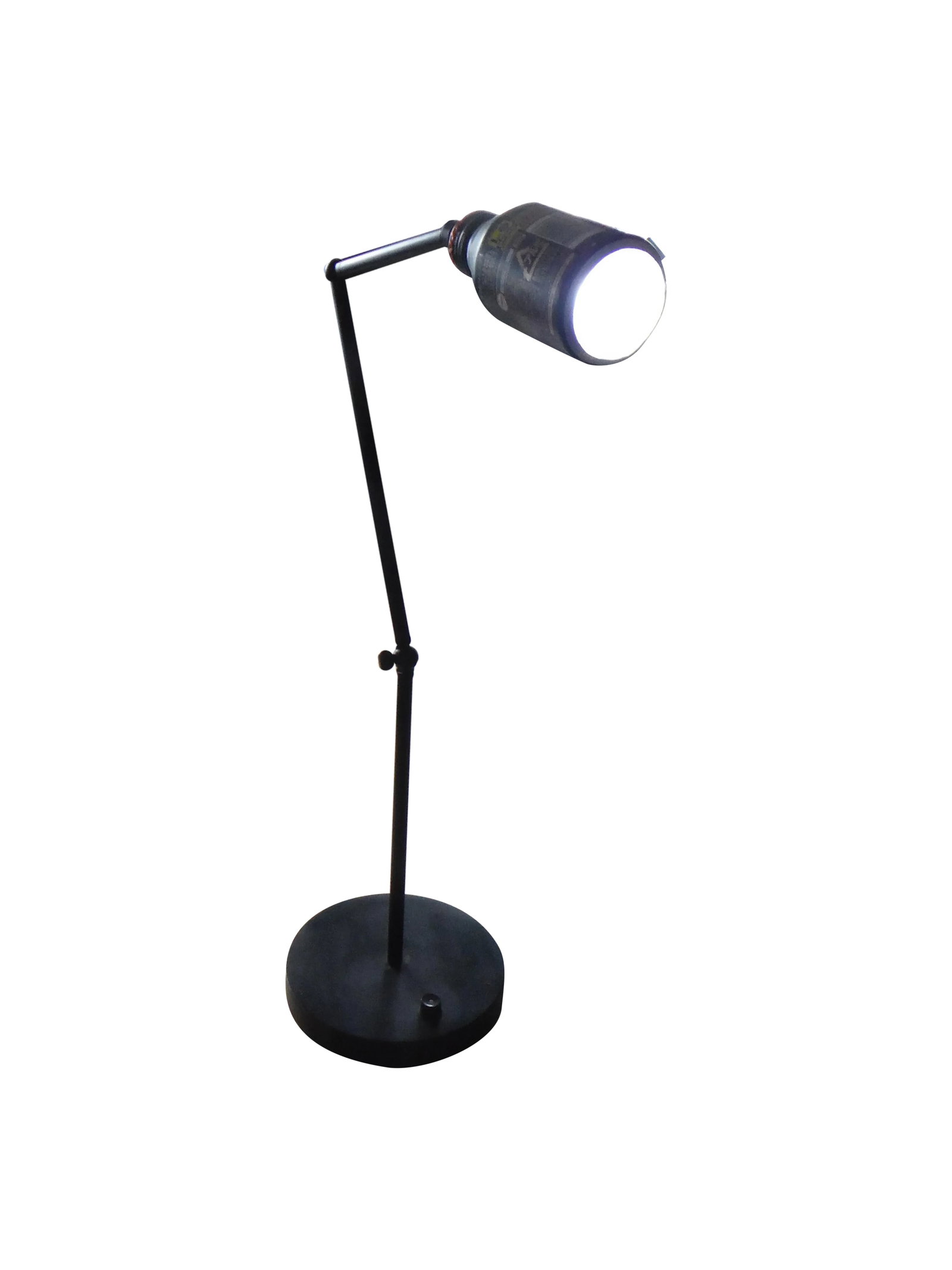 Georgie Desk Lamp: This mixed metal desk lamp is assembled from steel and brass. It has an aluminum vending machine coffee can shade the seller found while traveling around Japan. LED light source with on off switch.