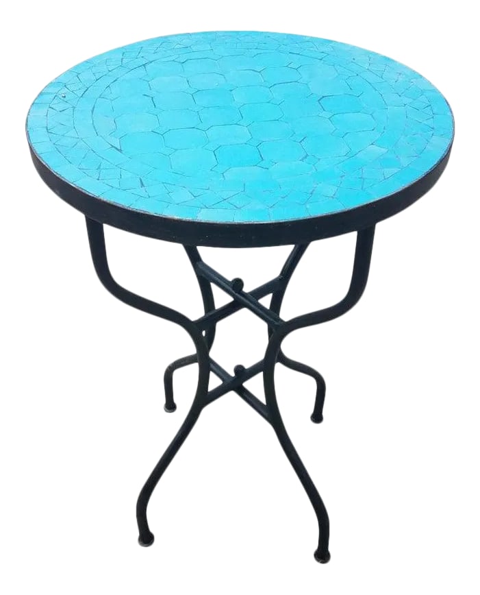20" Moroccan Turquoise Mosaic Table: 100 % glazed round. All Turquoise Moroccan mosaic table measuring approximately 20" in diameter. For both indoors and outdoors. Great as a cocktail table. Vibrant color. Intricate patterns. Included i