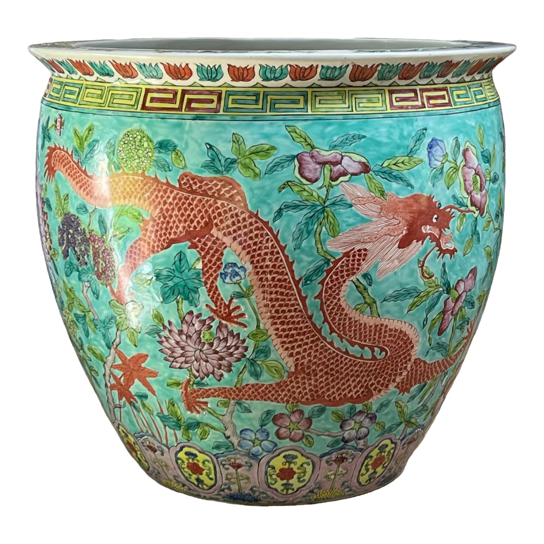 Large Famille Rose Fishbowl Jardinierre: This magnificent hand-painted fishbowl jardinierre is a true showstopper that brings timeless elegance and vibrant color to any space. Set against a brilliant turquoise background, this exceptional