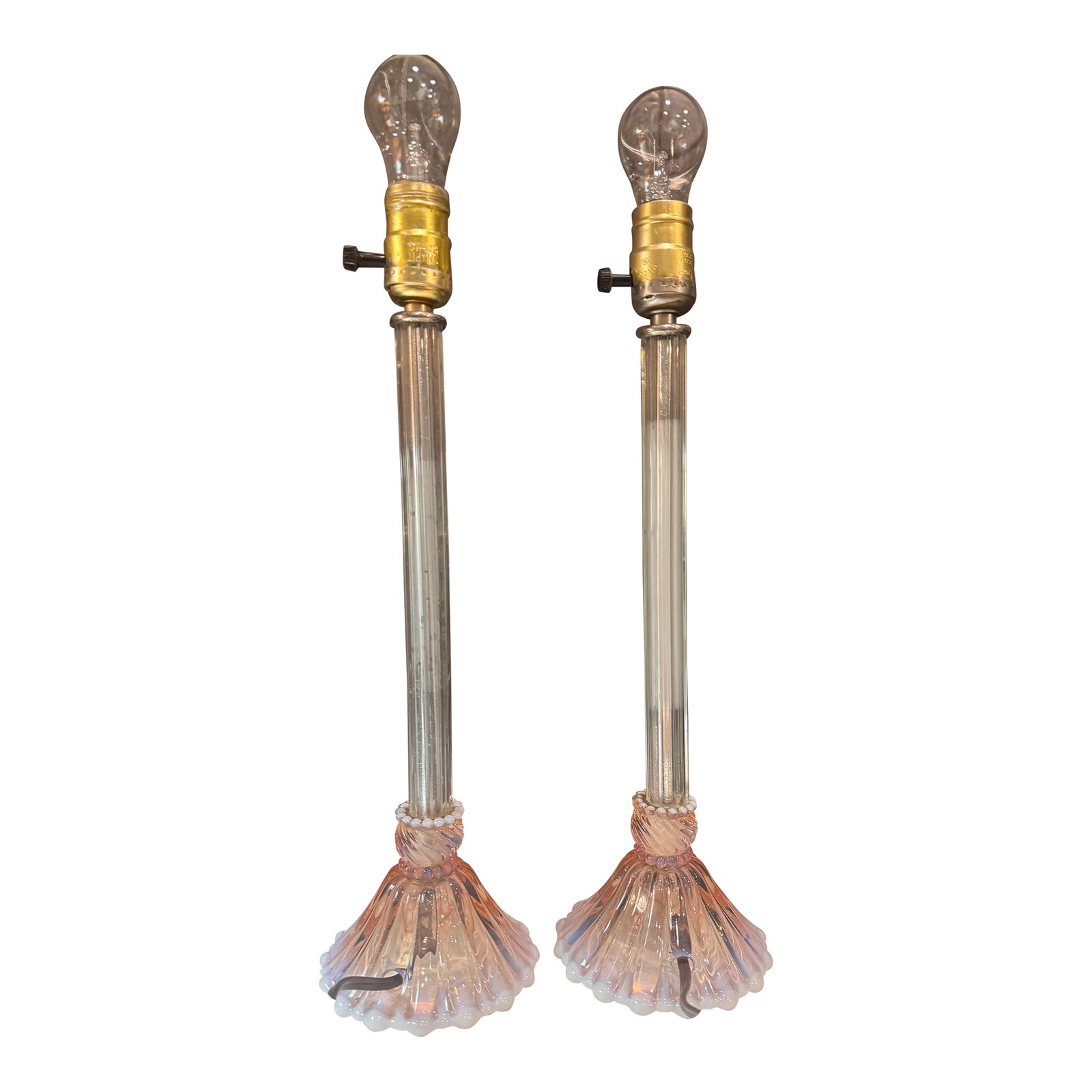 1920s Pair of Stunning, Antique / Art Deco Candlestick Lamps: This boudoir lamp pair is attributed to Fostoria. Made from iridescent pink opalescent glass and clear glass. The column candlestick table lamps feature a distinct, vertically fluted base that flares 