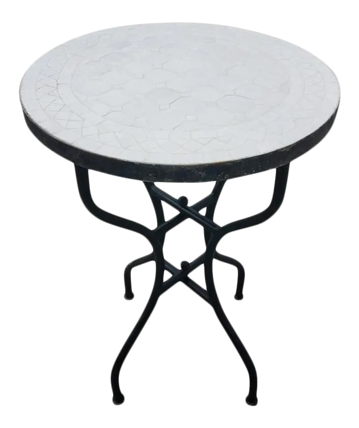 20" Moroccan White Mosaic Side Table: 100 % glazed round. All white Moroccan mosaic table measuring approximately 20" in diameter. For both indoors and outdoors. Great as a cocktail table. Vibrant color. Intricate patterns. Included in