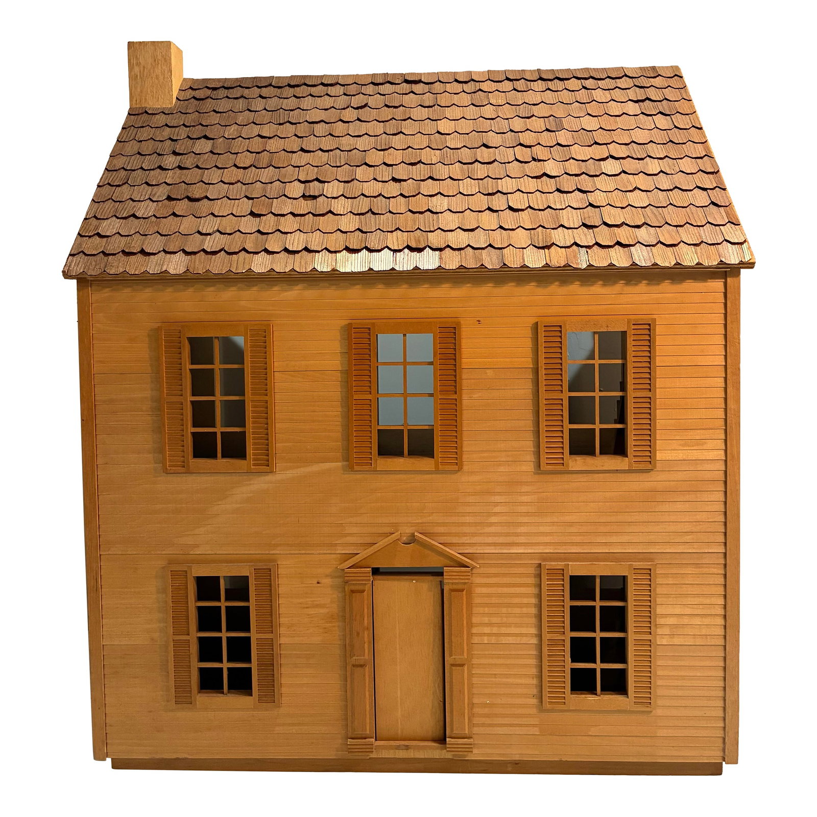 Vintage Wooden Dollhouse: The vintage wooden dollhouse 1:12 scale; made in the USA in the 1990's. It is a large size house with 3 floors and 6 rooms and 2 staircaes. The assembled wood doll house is unfinished making it