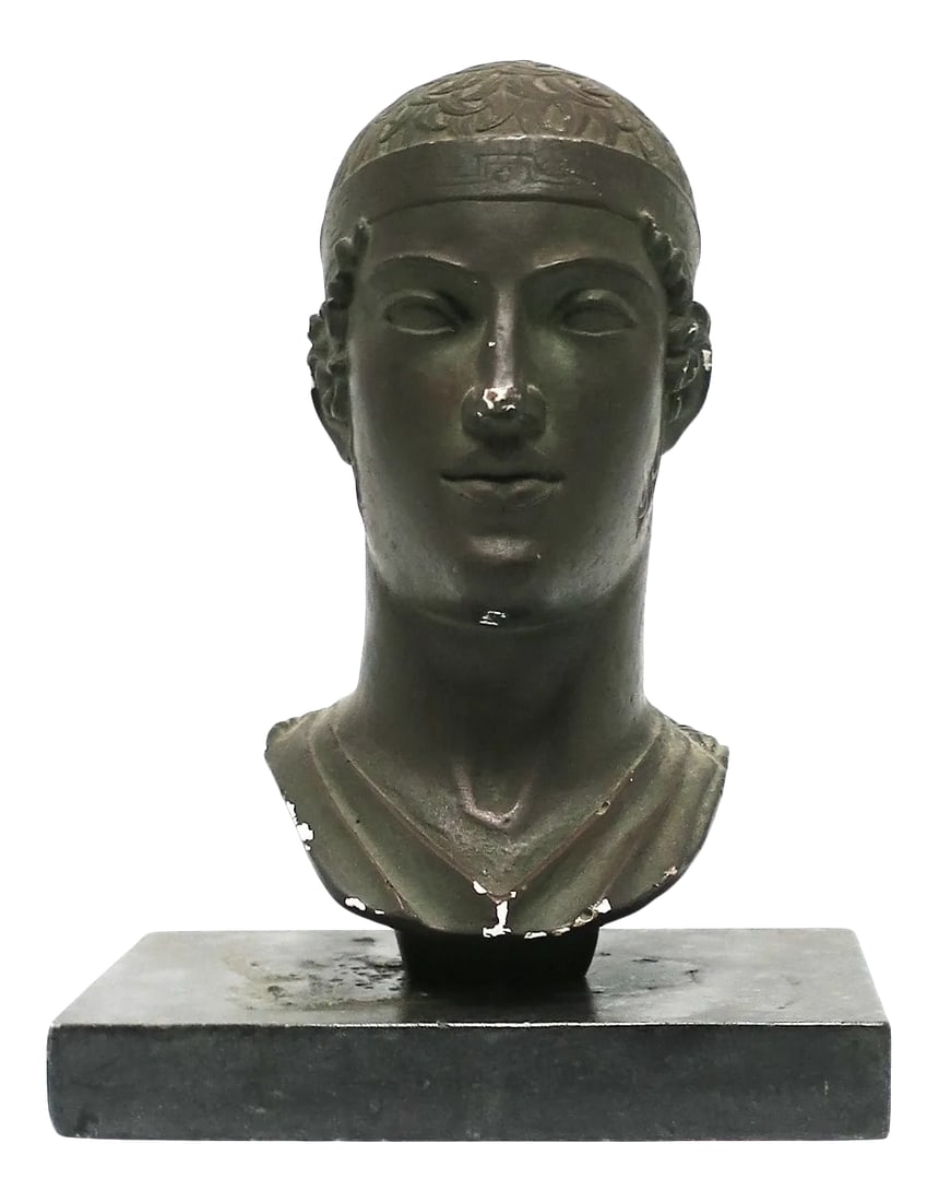 Greek or Roman Head Bust Sculpture, 1965: A mid-20th century Greco-Roman sculpture head or bust, England, 1965. A reproduction piece made of chalkware or plaster with a dark bronze-like finish. Marked on side as show in image #10. Vintage sto