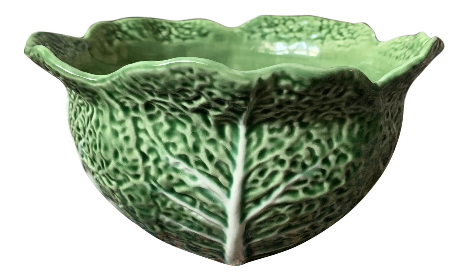Vintage CabbageWare Bowl From Portugal: Beautiful and large Cabbageware bowl from Portugal. The Bordallo Pinheiro company was created by master artist Rafael Bordallo Pinheiro and is known for producing nature-inspired earthenware since