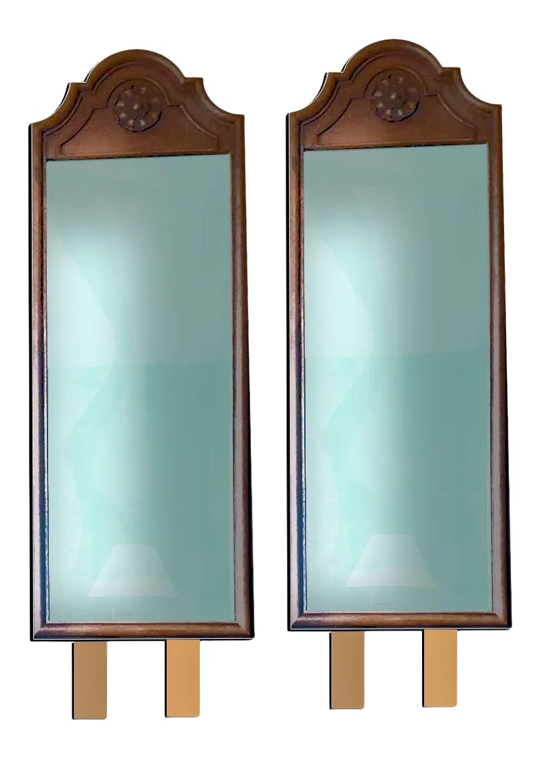 German Baroque Revival Tilting Resin Walnut Framed Dresser Mirrors - a Pair: Two handsome dresser mirrors framed in a faux bois style molded walnut resin designed to appear like real sculpted wood with a scrolling crown that peaks at the top and frames a rounded floral German