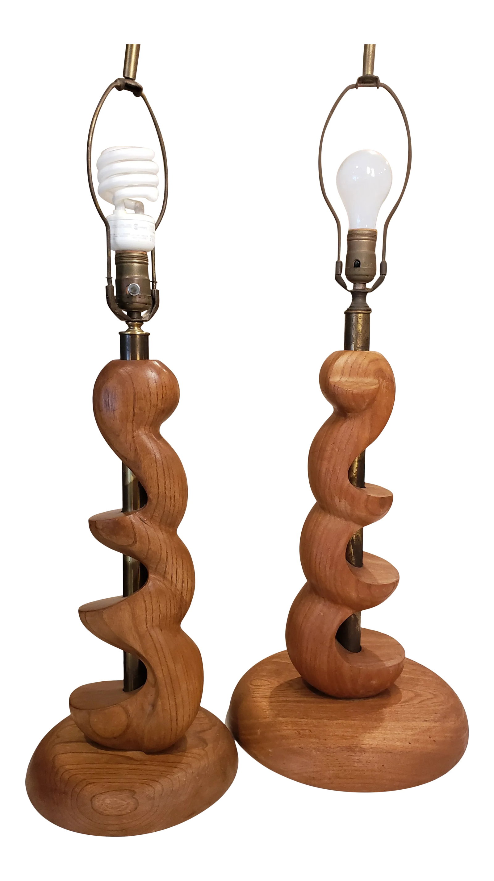 Mid-Century Organic Sculpture Form Wood Lamps - a Pair: This listing consists of a pair of Midcentury organic sculpture lamps. The brass center poles needs polishing but will leave that to new owner. They both work well and there are no shades. One looks p