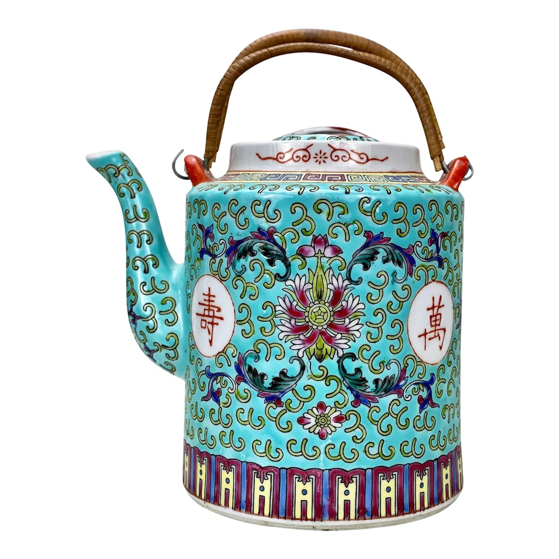 Vintage Chinese Porcelain Famille Verde Enamel Floral Motif Teapot: A Chinese Porcelain Famille Verde Enamel Teapot, c. Mid 20th Century. This Teapot would look exceptional while displayed in an array of interior styles. The white porcelain is heavily decorated throug