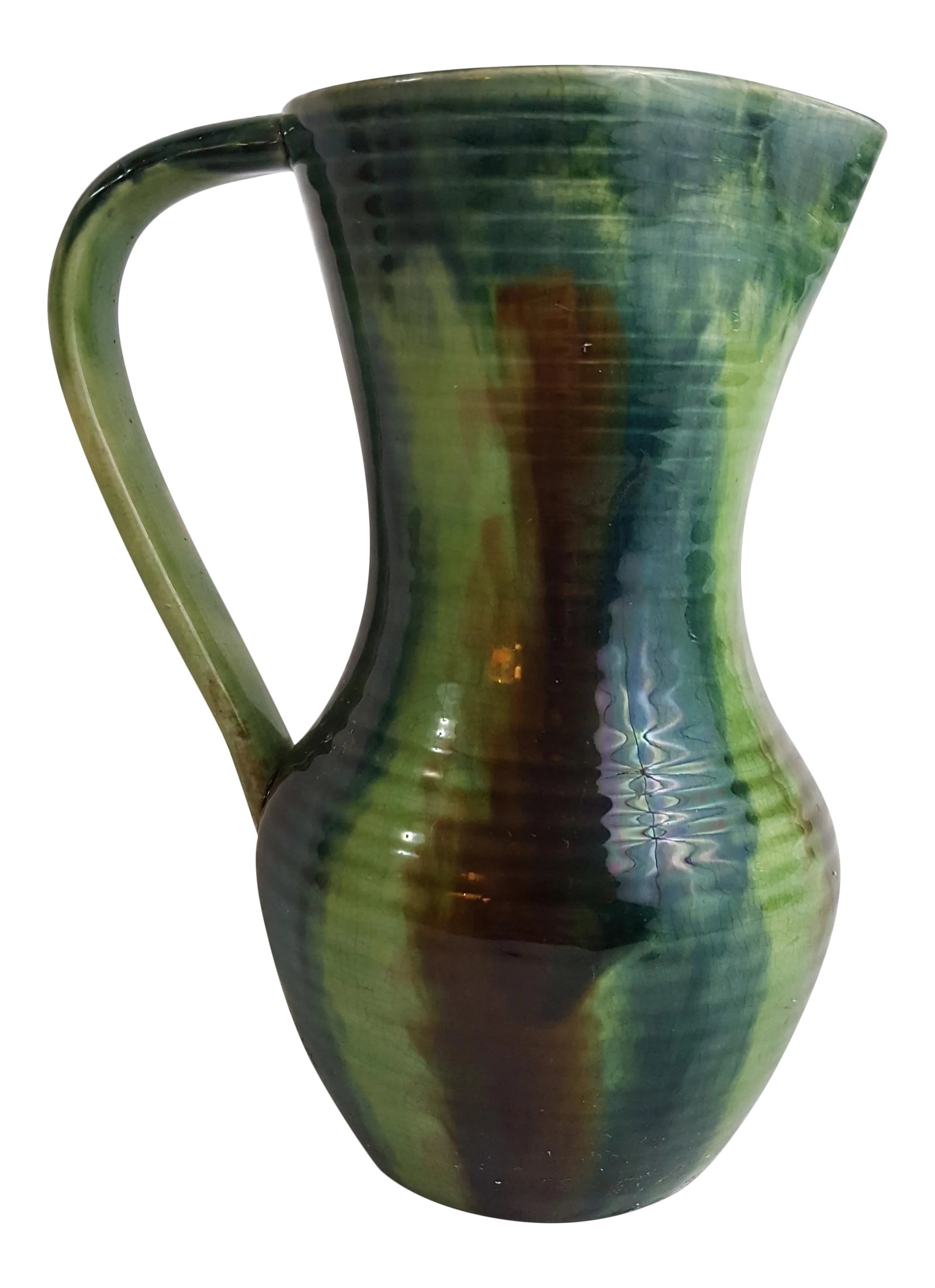 Belgian Art Pottery Jug With Brown Green and Navy Glaze: Gorgeous multicolor drip technique glaze. Simple lines on the pitcher allowing the glaze to shine. Small repair on lip of pitcher. Acquired from the UK. Condition: Alterations: Original Condition Unal
