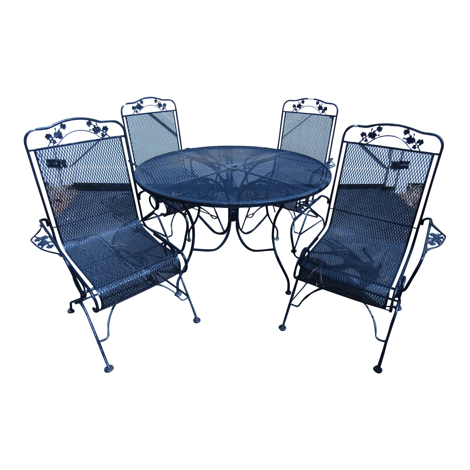 Vintage Metal Outdoor Dining Set: This vintage metal outdoor dining set combines four metal armchairs with a rounded table, all in a design that features black painted metal frames. Condition: Age appropriate wear, rust, scratches, sc