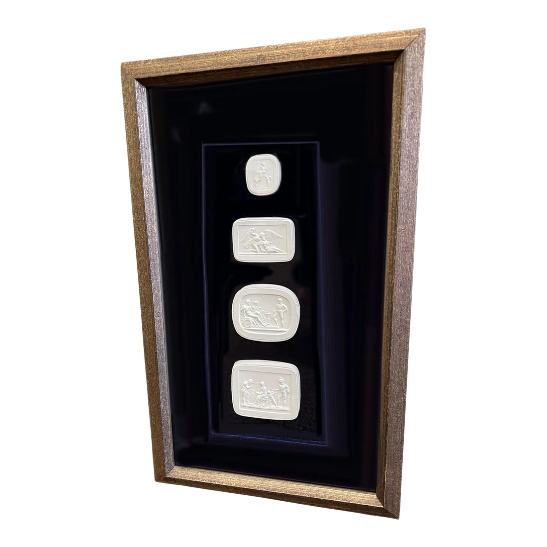 19th Century Italian Grand Tour Intaglios: Set of four framed Grand Tour Intaglio bust on black. 19th century, Italy. Condition: Alterations: Original Condition Unaltered Imperfections: Some Imperfections Condition Notes: Excellent condition