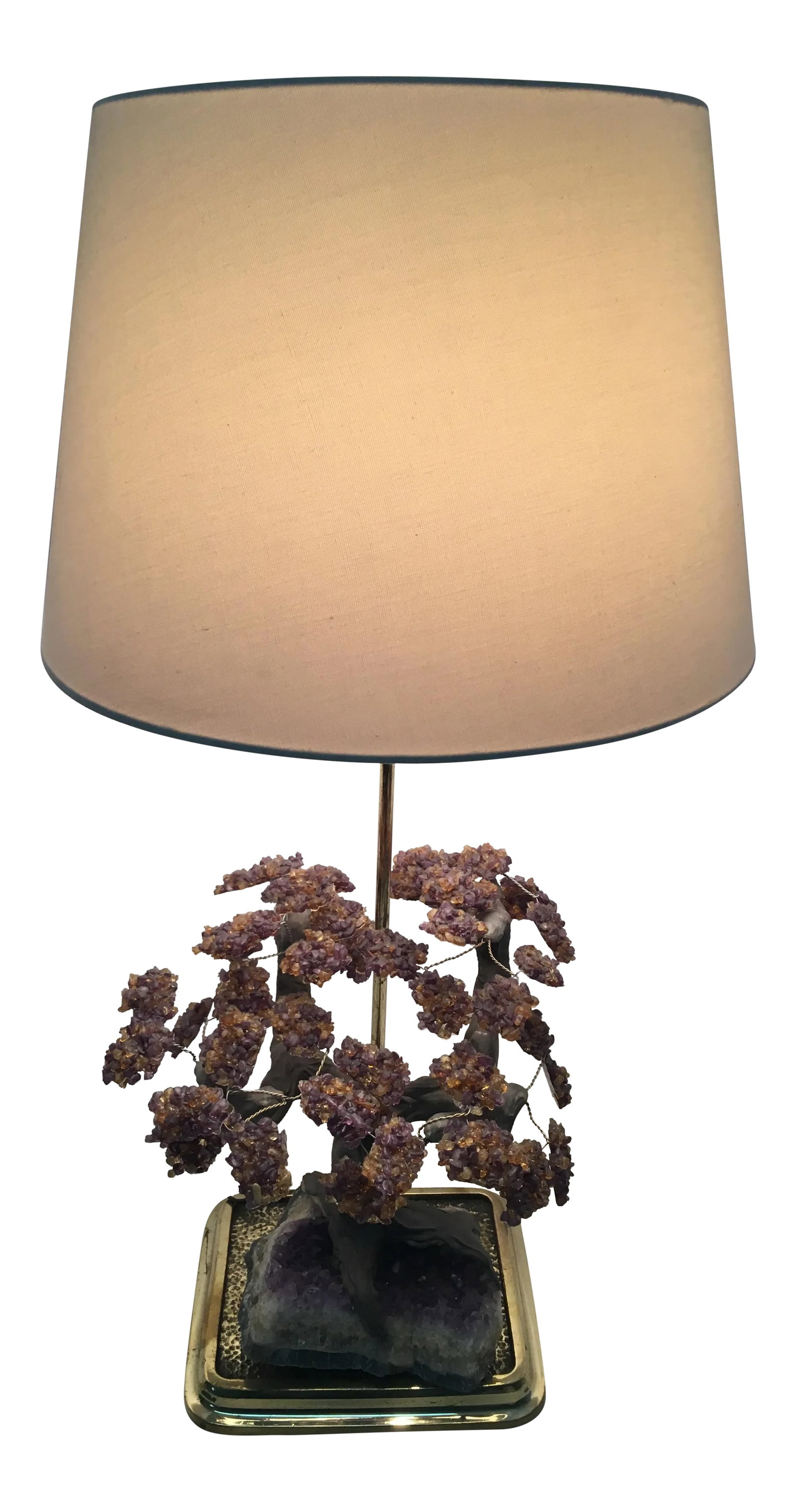 Amethyst Rock Crystal Lamp: Stunning crystal table lamp made from the amethyst rock crystal. A one of a kind lamp! It is in excellent condition. The height is 24" up to the socket. Condition: Alterations: Original Condition