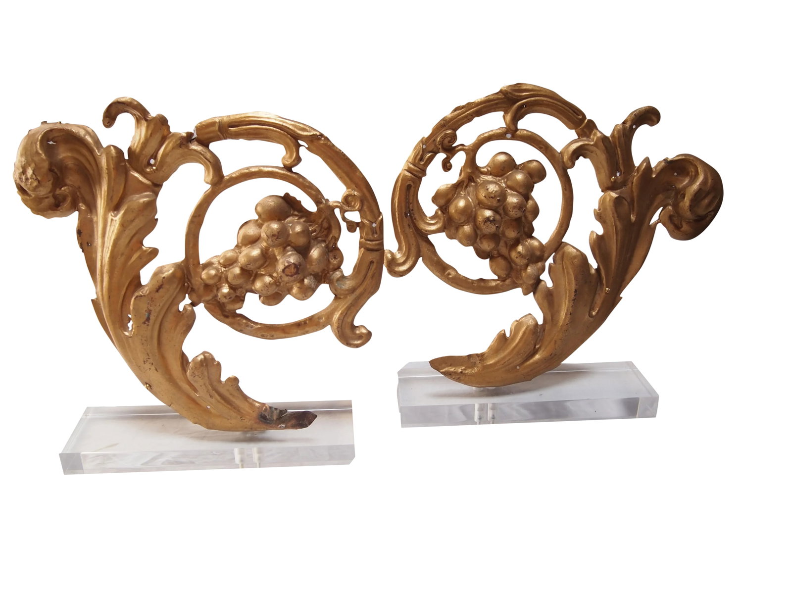 19th C. Gilt Metal Architectural Fragments - A Pair: Pair of 19th C gilt metal architectural fragments. Beautiful scrolling acanthus leaf with grapes design. A matched pair mounted on a rectangular lucite blocks. In good condition with age appropriate w