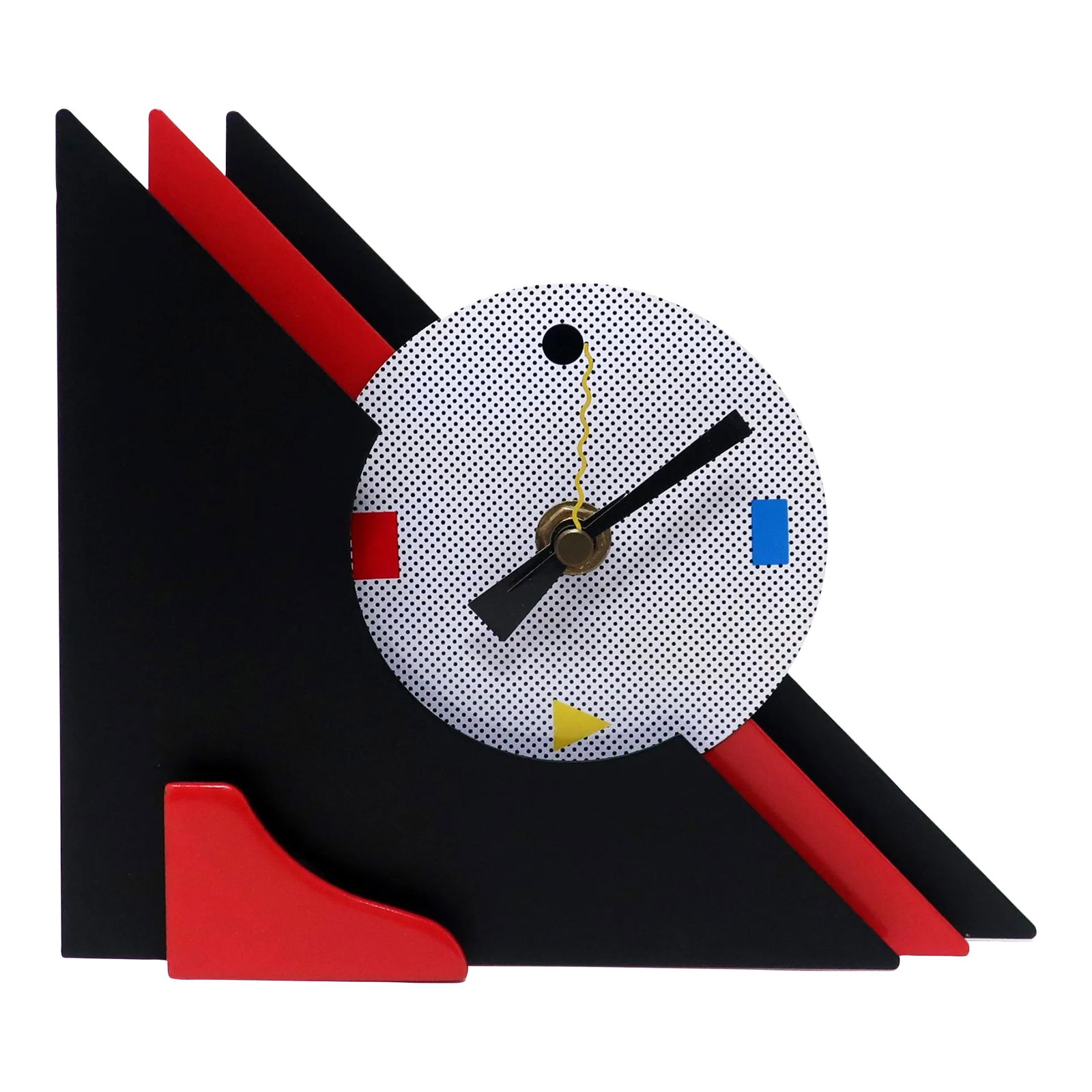 1980s Red & Black Stacked Desk or Mantel Clock: With a stunning combination of red and black enameled metal, red lucite accents, and primary colored shapes at 3, 6, and 9, this postmodern clock is designed with a stacked triangular design that give